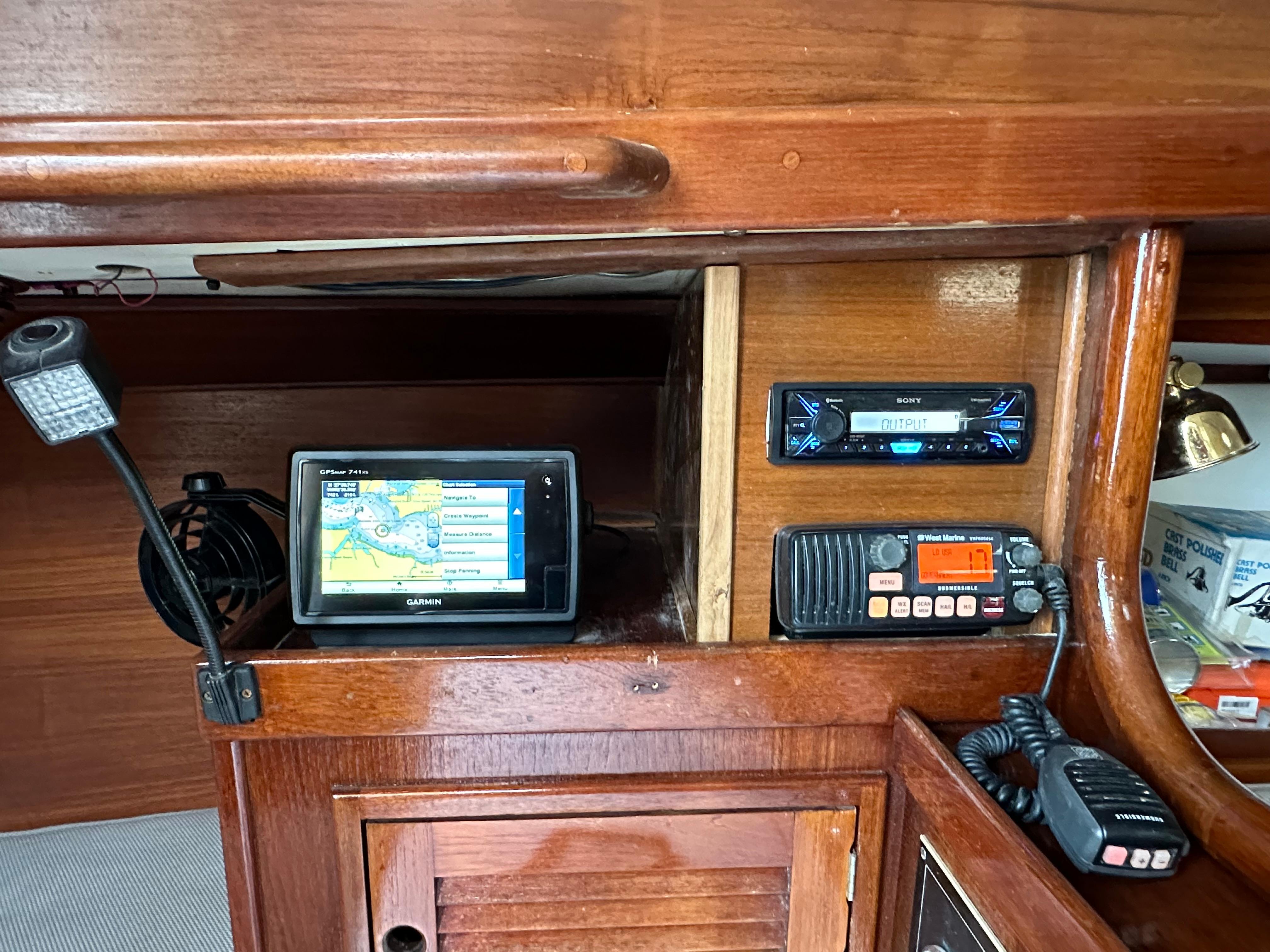 Navigation and communication equipment inside a 1981 Tartan 37 sloop sailboat cabin.