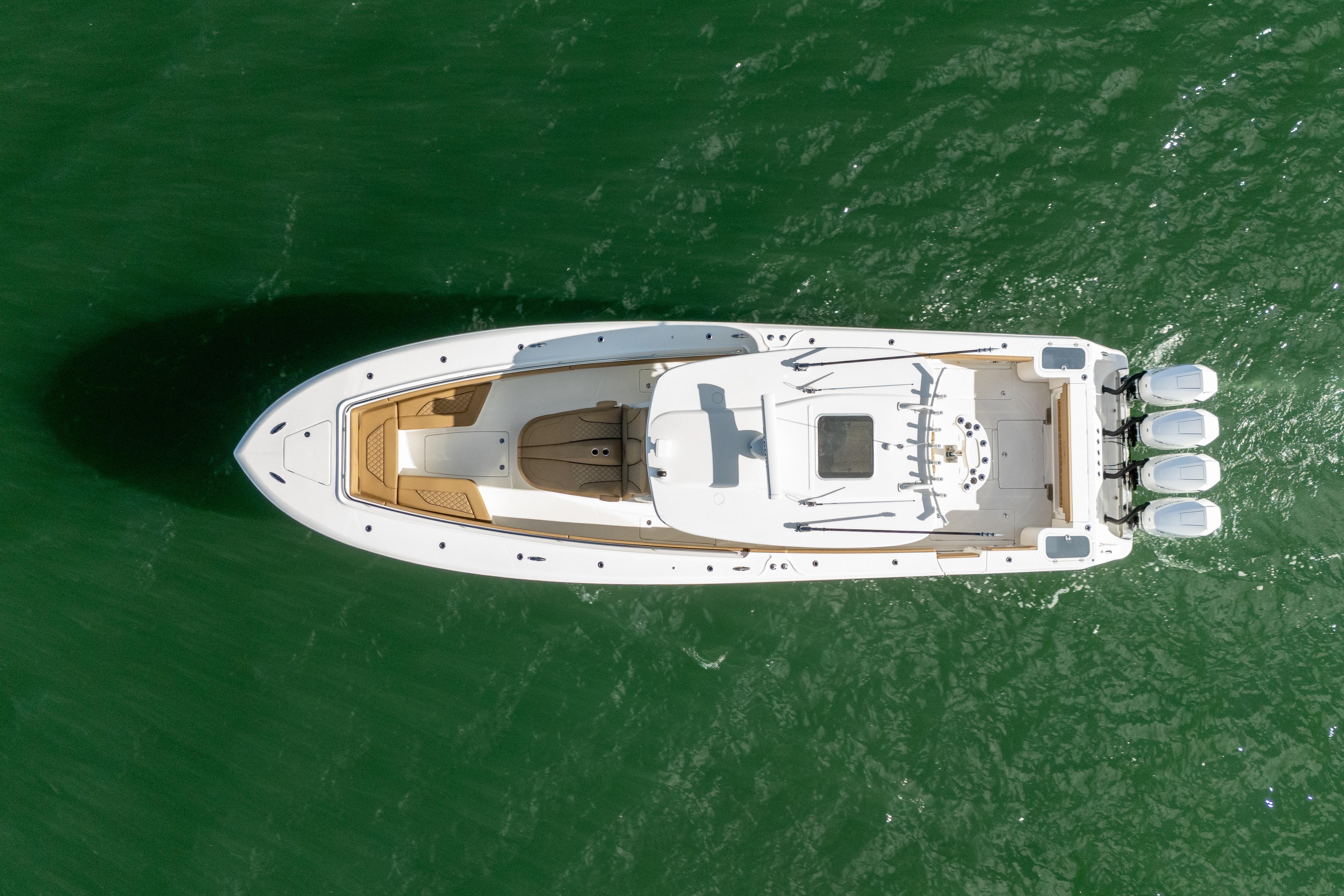 Aerial view of 2026 Blackwater 41 Performance Fish boat on green water.