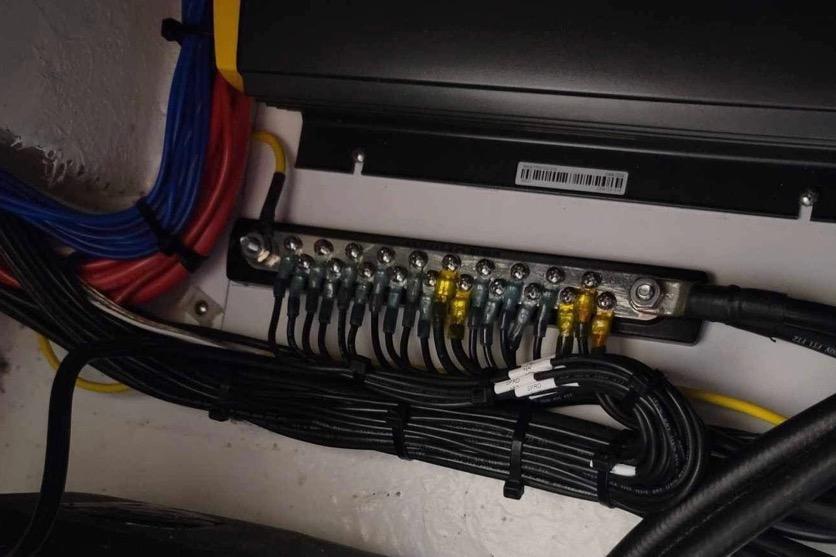 Electrical wiring and fuse panel in a 2021 Custom Infusion 34 CC boat.