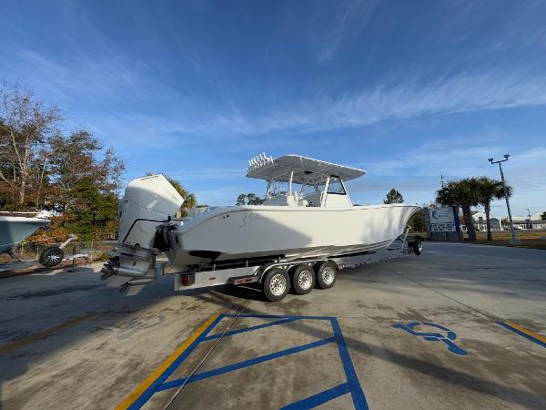 2025 Yellowfin 39 Offshore boat on a trailer in a parking lot.