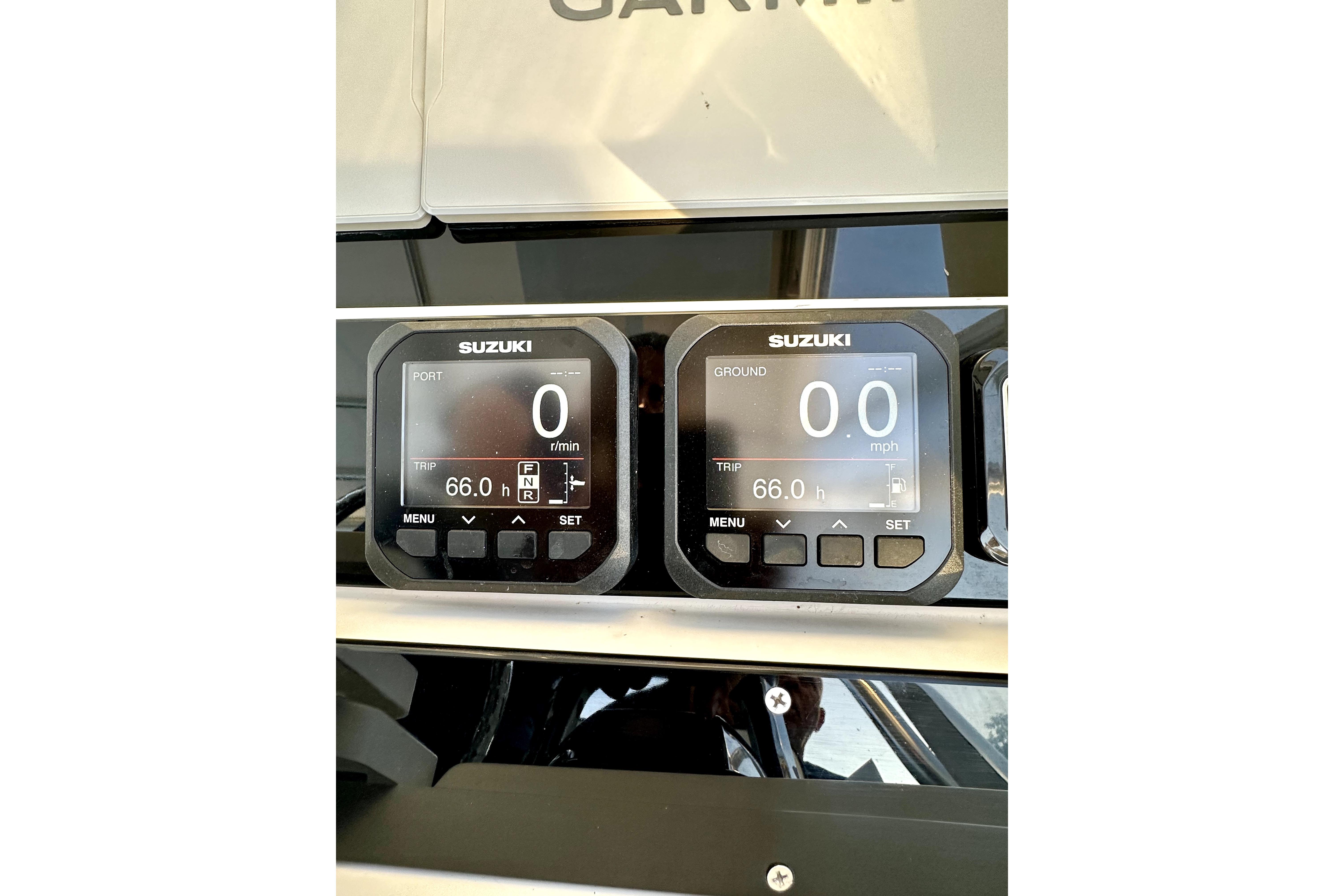 Digital display on 2006 Contender 35 Express Side Console boat dashboard.