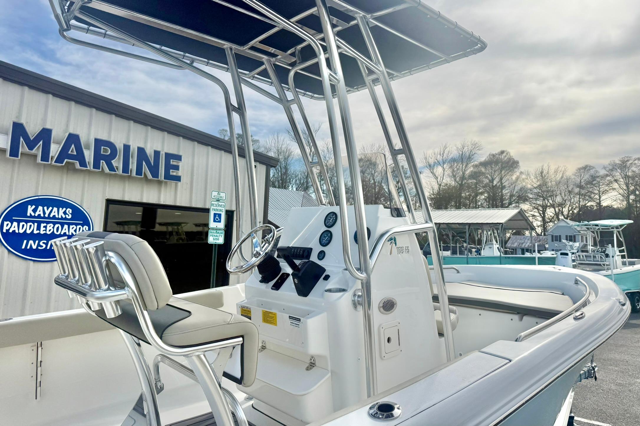 2026 Key West 189 FS boat with T-top at a marine dealership.