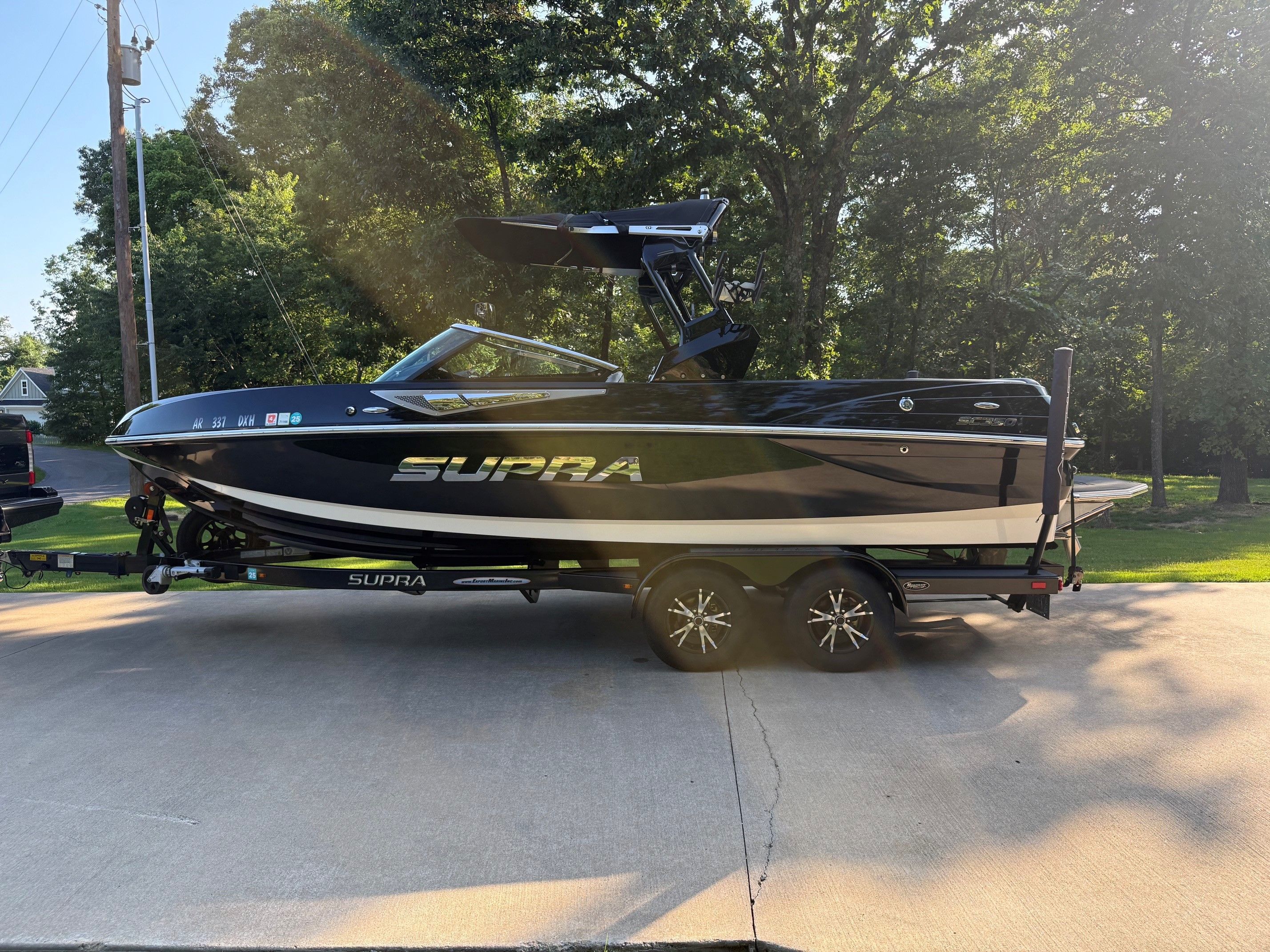 2014 Supra SC350 on a trailer, ready for adventure.