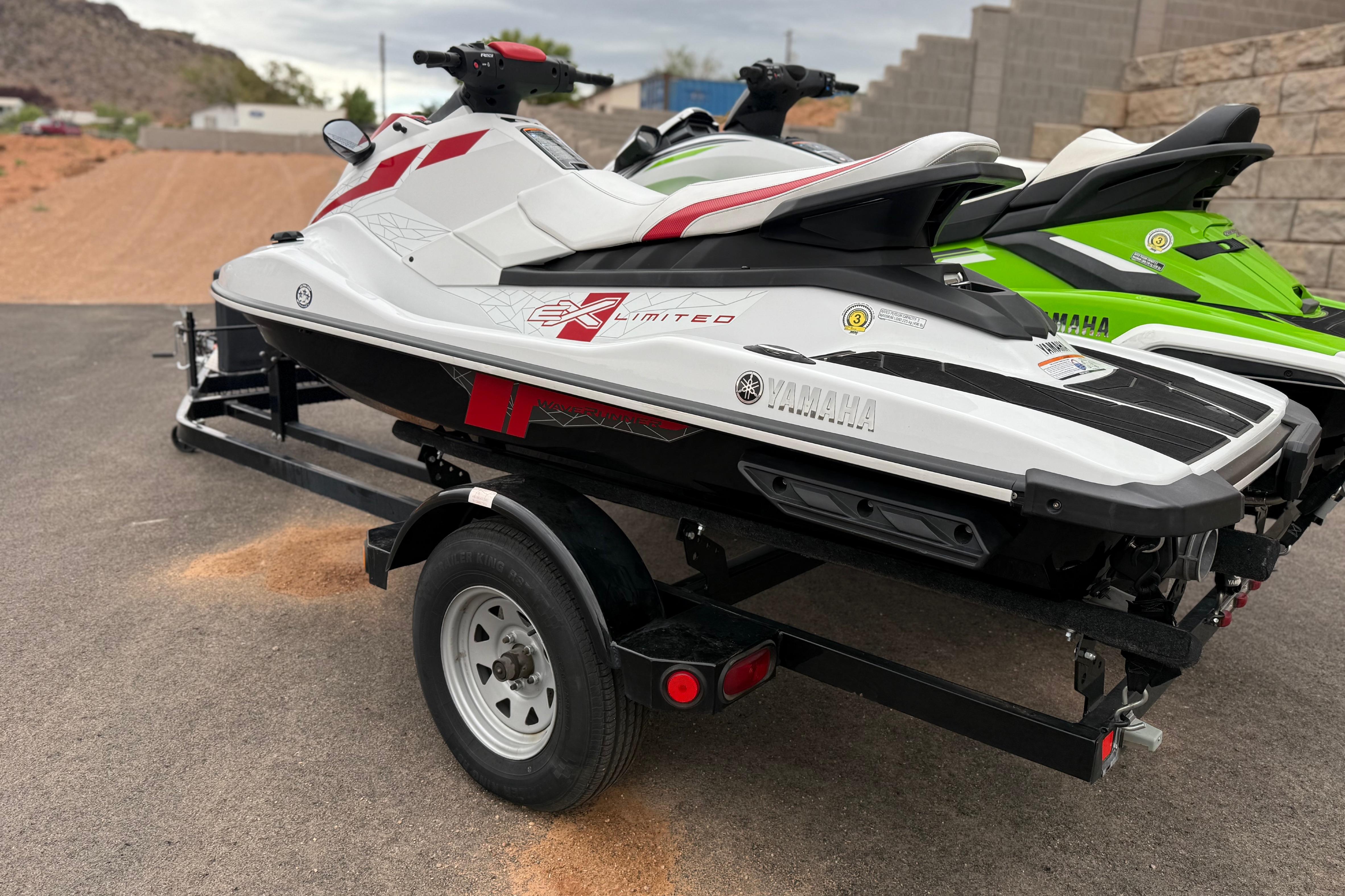 2021 Yamaha WaveRunner EX Limited on trailer, white and red design, parked outdoors.