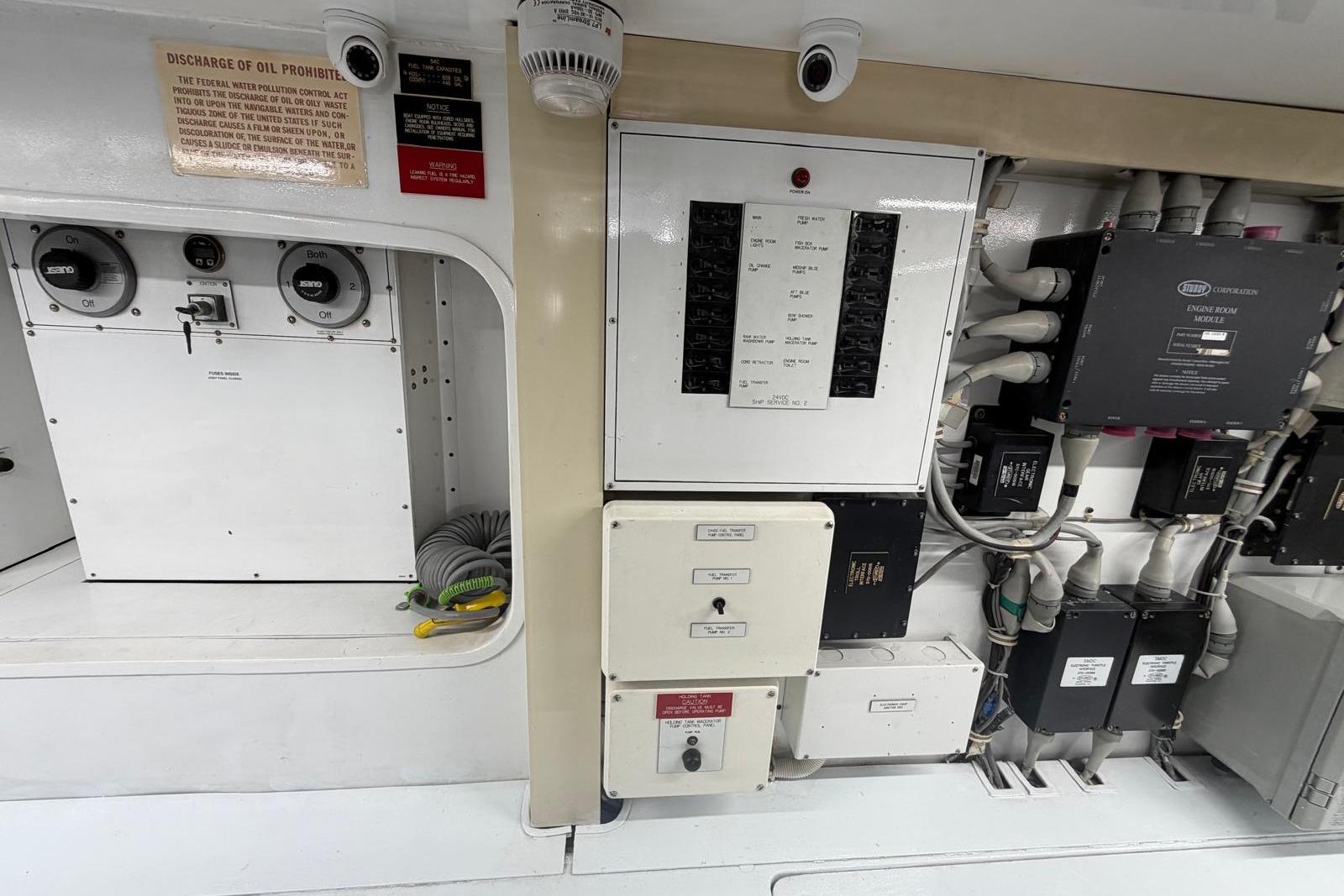 Electrical panel and controls inside a 2003 Hatteras 54 Convertible yacht.