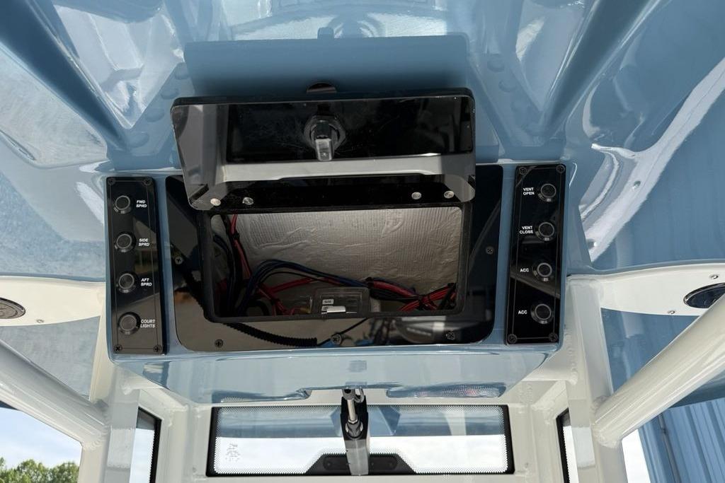 2026 Tidewater 232 LXF boat dashboard with control panel and wiring.
