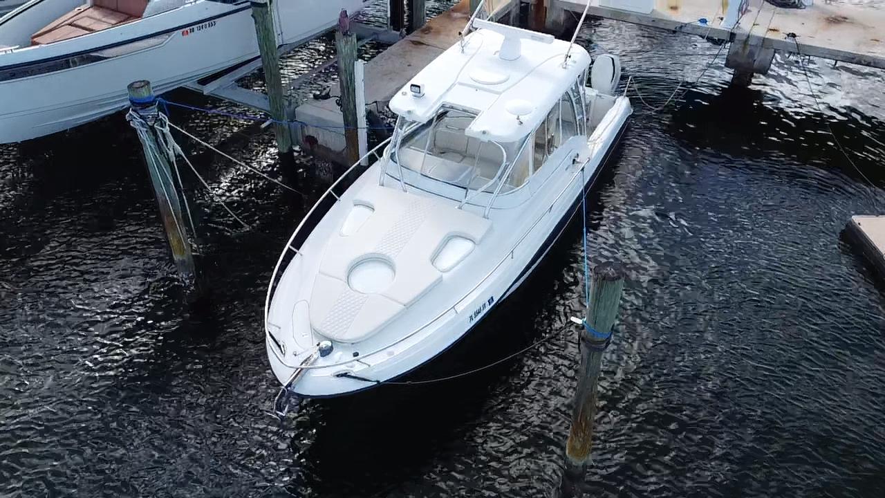 2006 Hydra-Sports Vector 3300 VX boat docked in marina, aerial view.
