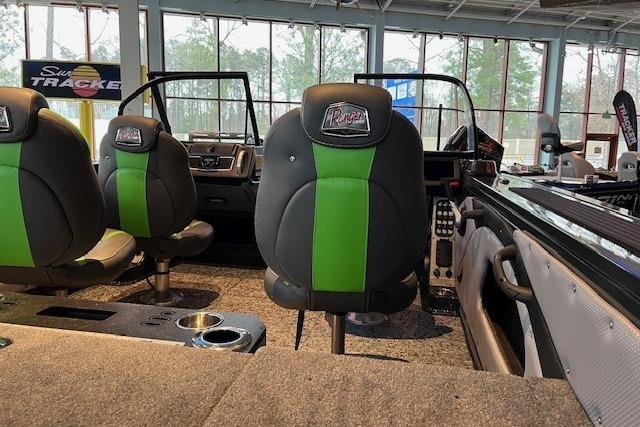 2026 Ranger VX1888 WT boat interior with green-accented seats and modern dashboard.