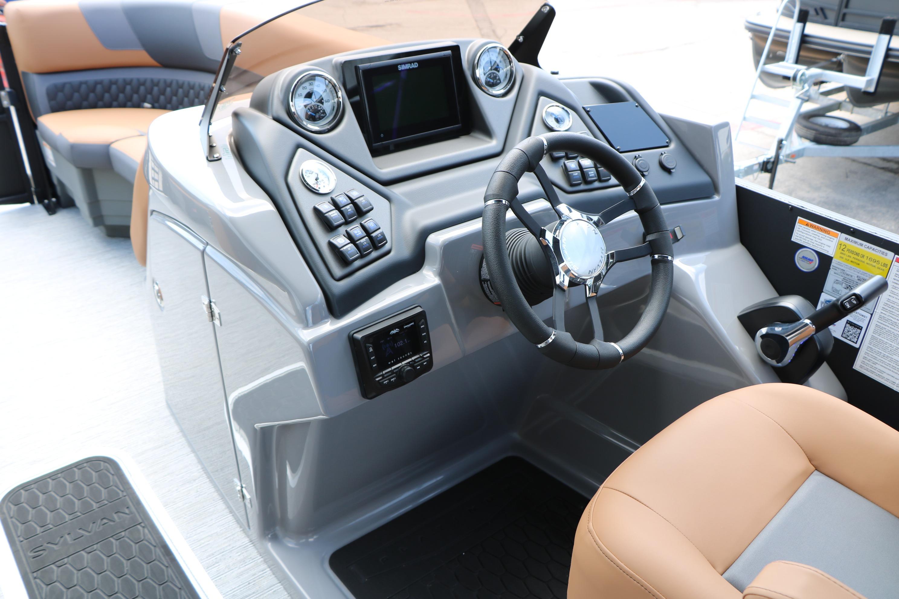 Interior view of 2026 Sylvan L3 DLZ Bar Platinum Edition Tri-Toon boat dashboard.