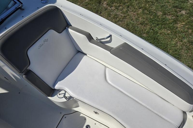2011 Sea Ray 300 Sundeck boat interior with white and gray seating.