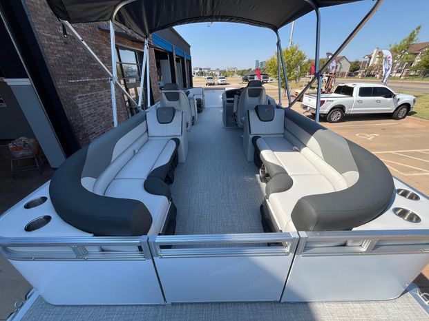Interior view of 2025 Tahoe LTZ QL pontoon boat with luxurious seating.