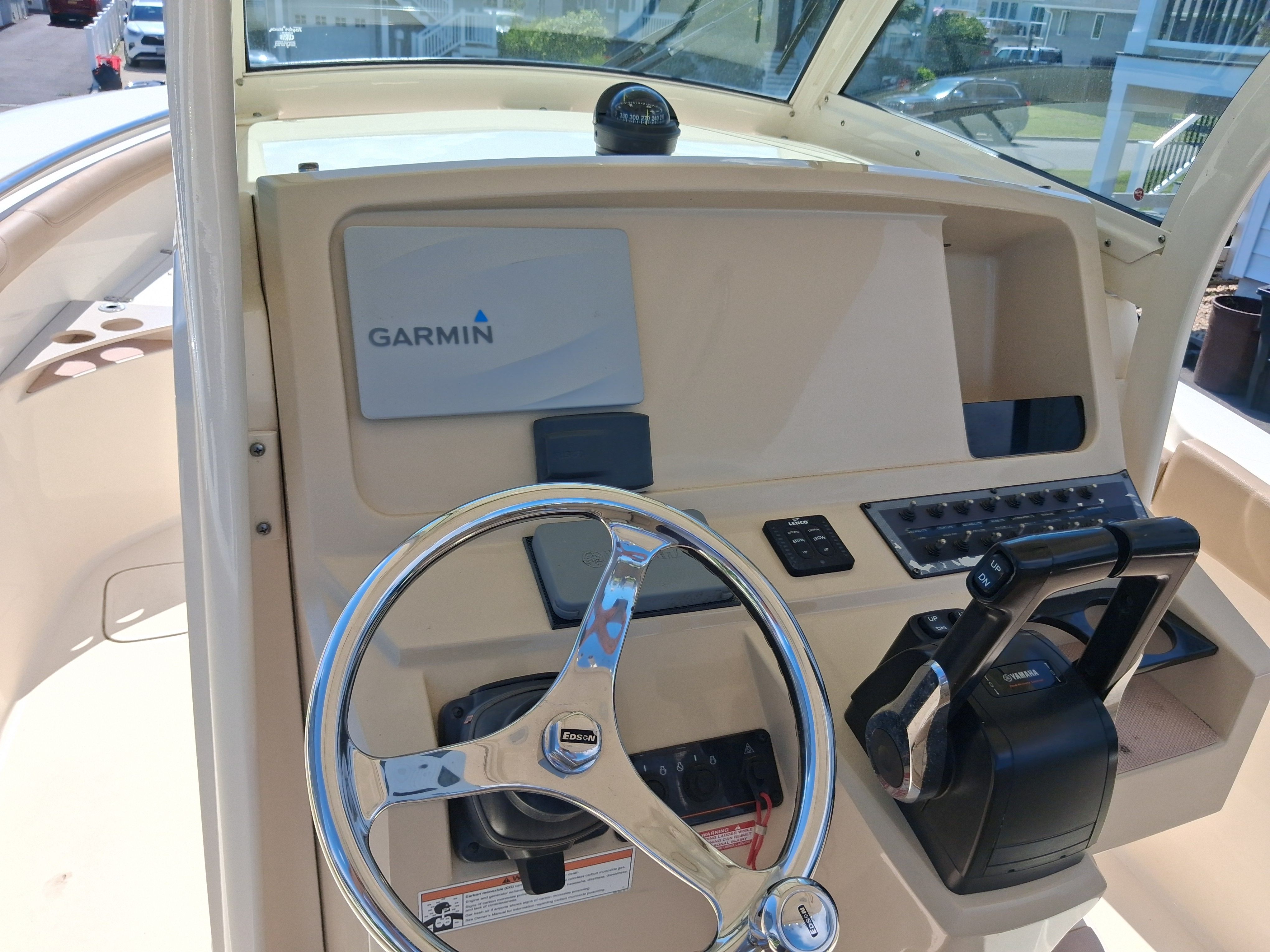 2018 Scout 255LXF boat helm with Garmin navigation system.