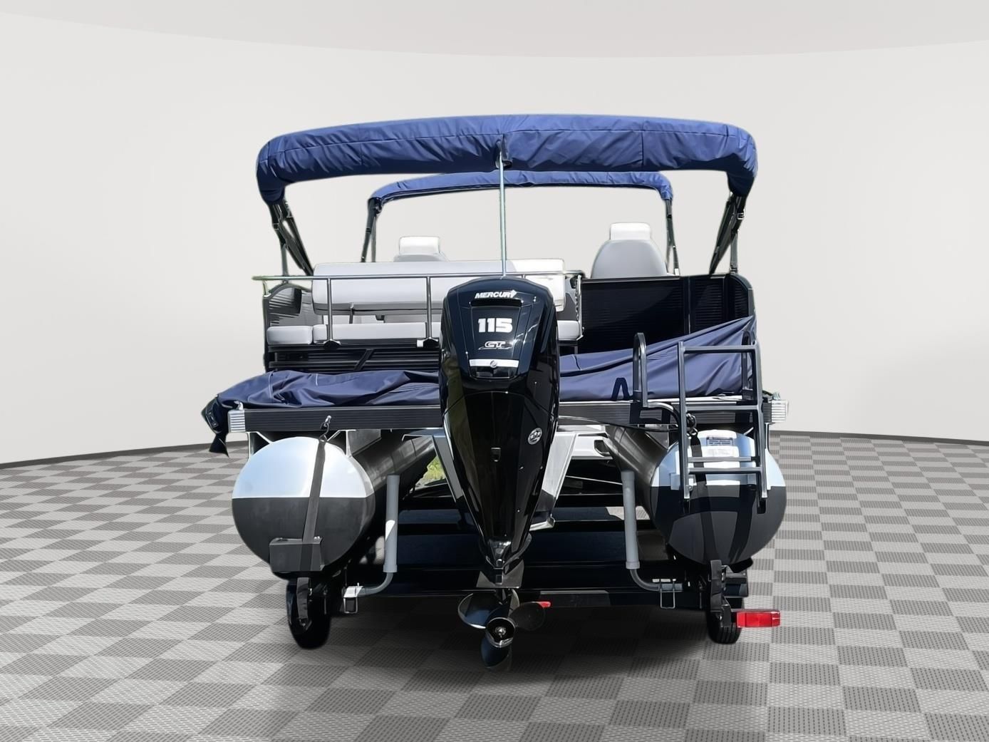 A 2025 Bennington S20 pontoon boat with a 115 HP outboard motor, on a trailer.