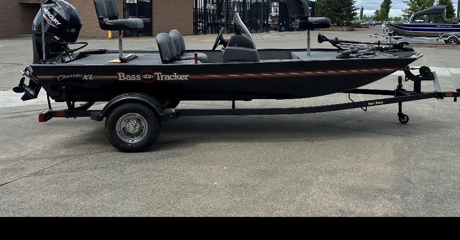 A 2023 Bass Tracker Classic XL boat on a trailer, ready for transport.