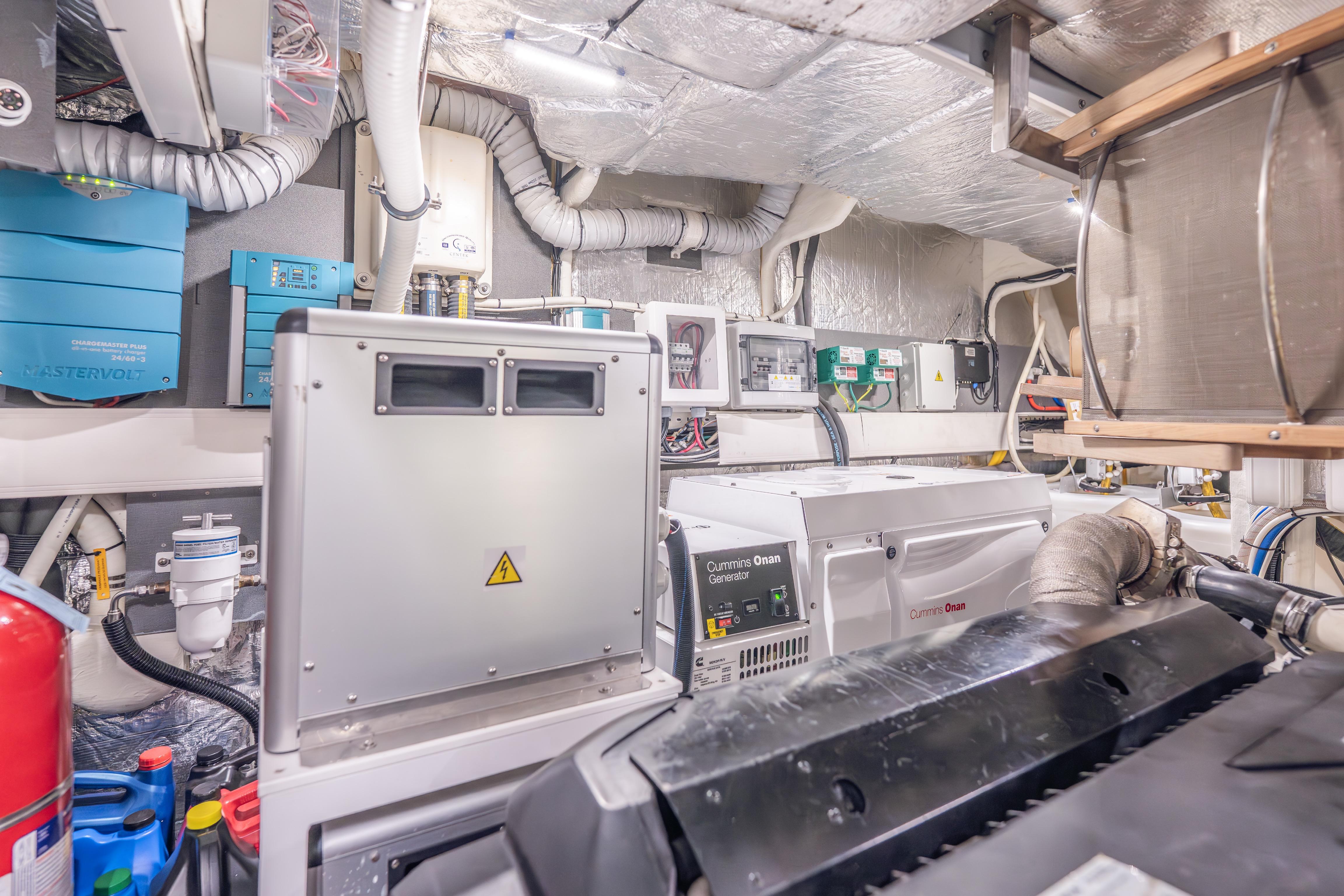 Engine room of 2019 Absolute 58 FLY yacht with Cummins Onan generator.