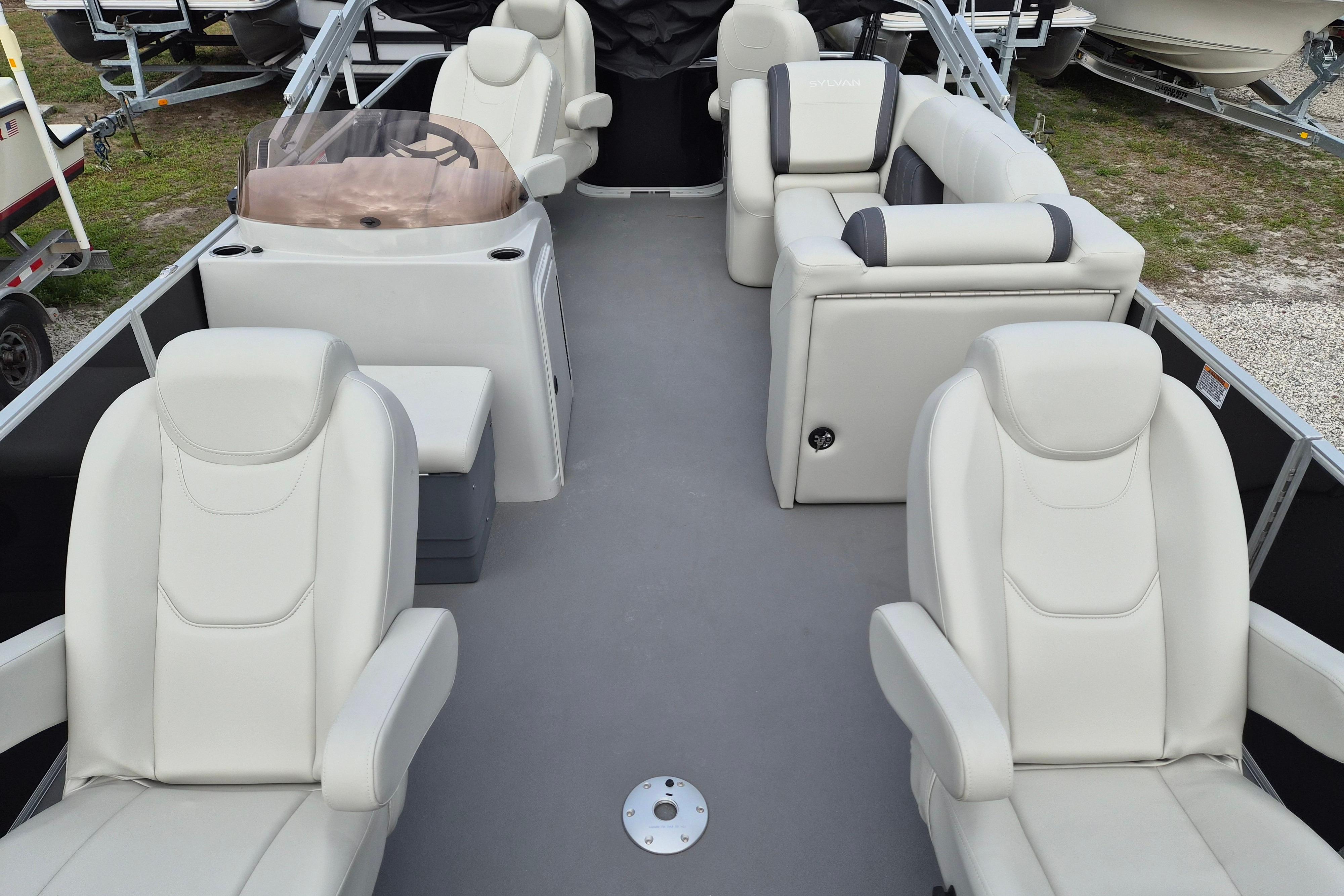 2025 Sylvan Mirage Fish 8522 Party Fish 4.0 interior with luxurious seating.