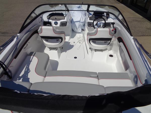 2023 Tahoe 210 Si boat interior with seating and dashboard.