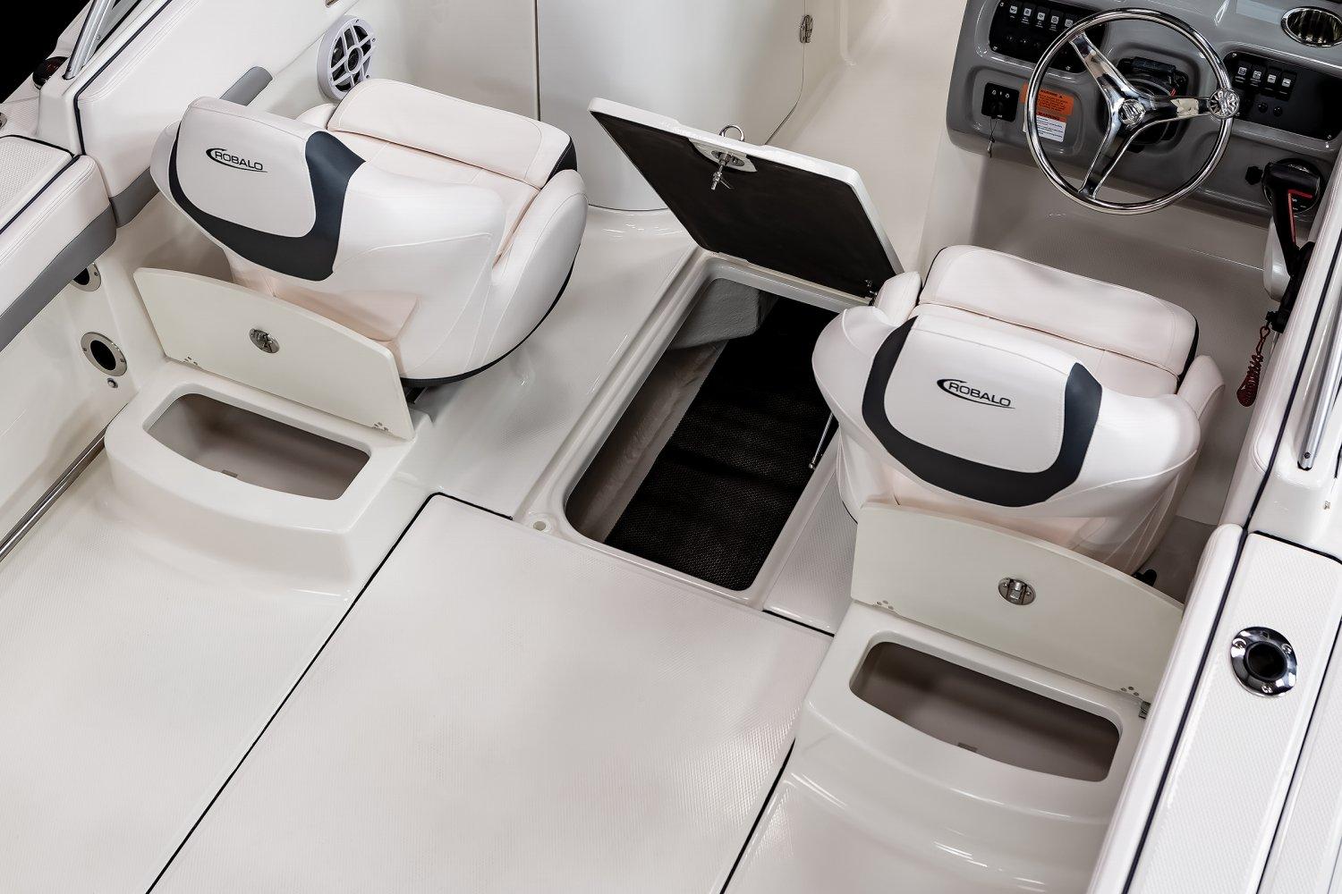 2024 Robalo R207 Dual Console boat interior with storage compartments and seating.