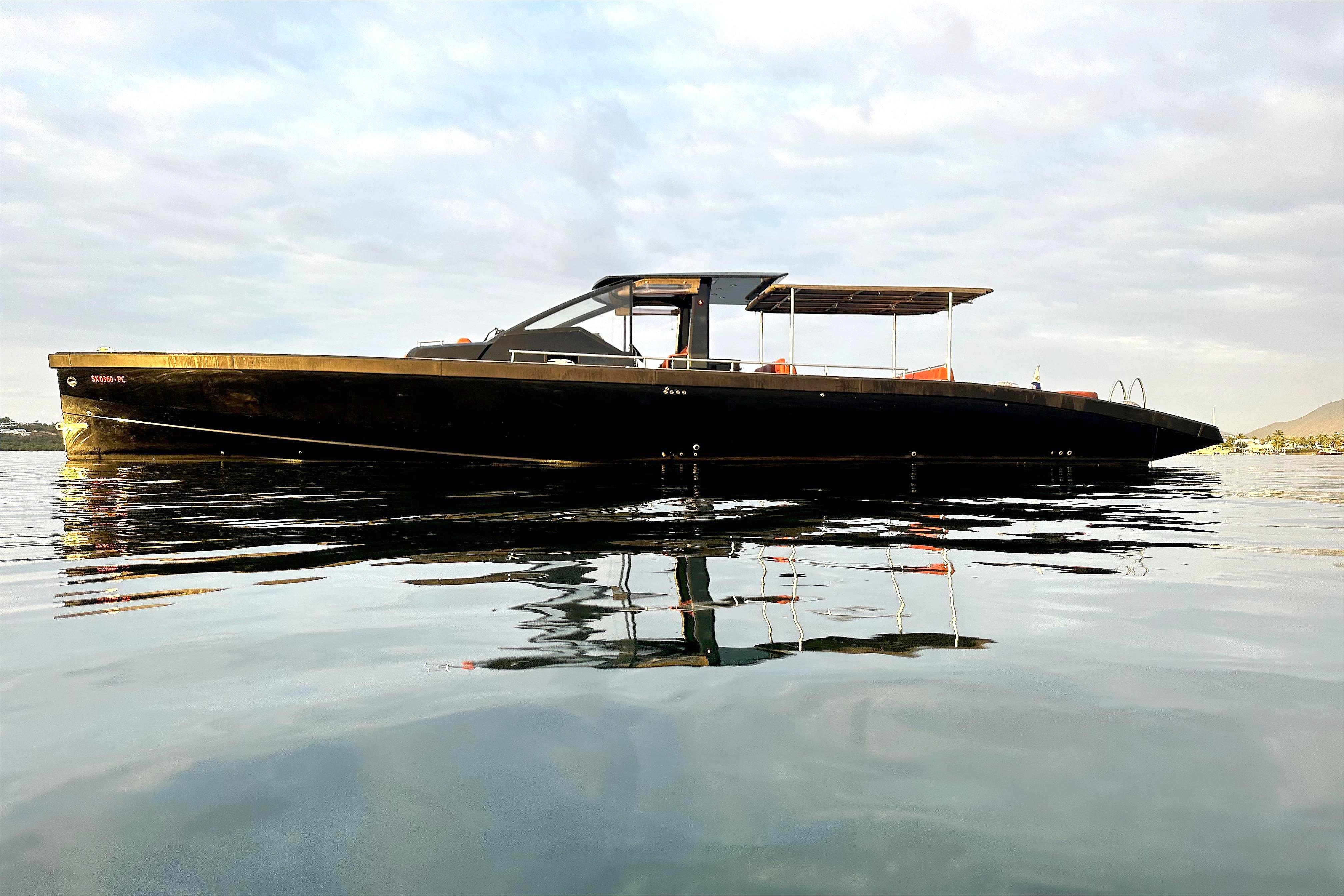 Windy SR52 yacht from 2013 on calm water.
