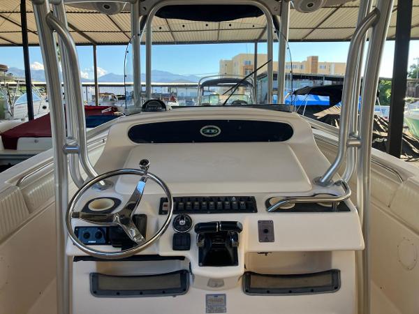 2006 Grady-White Bimini 306 boat dashboard with steering wheel and controls.