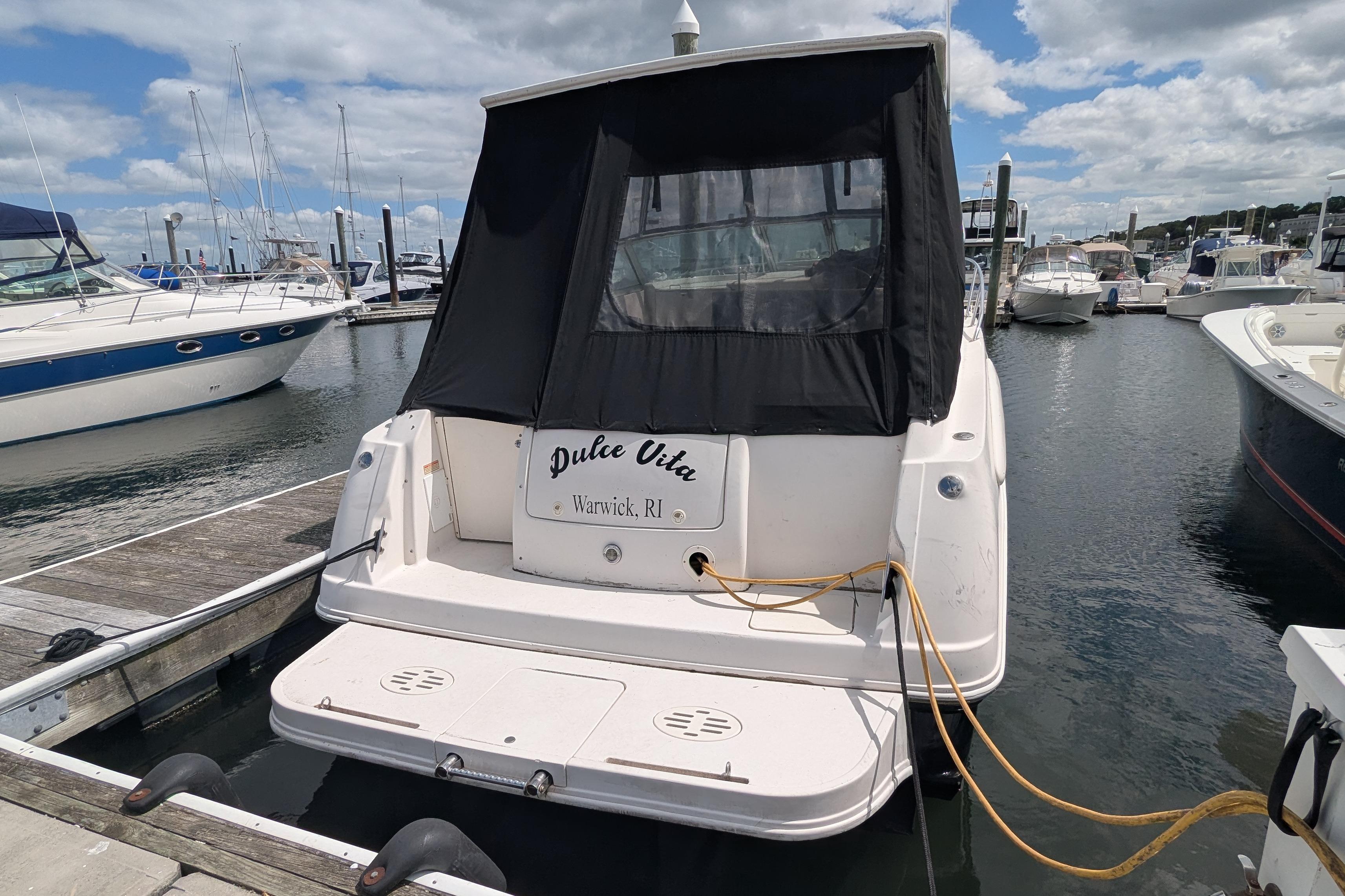2003 Monterey 282 Cruiser docked at marina, featuring "Dulce Vita" nameplate, Warwick, RI.