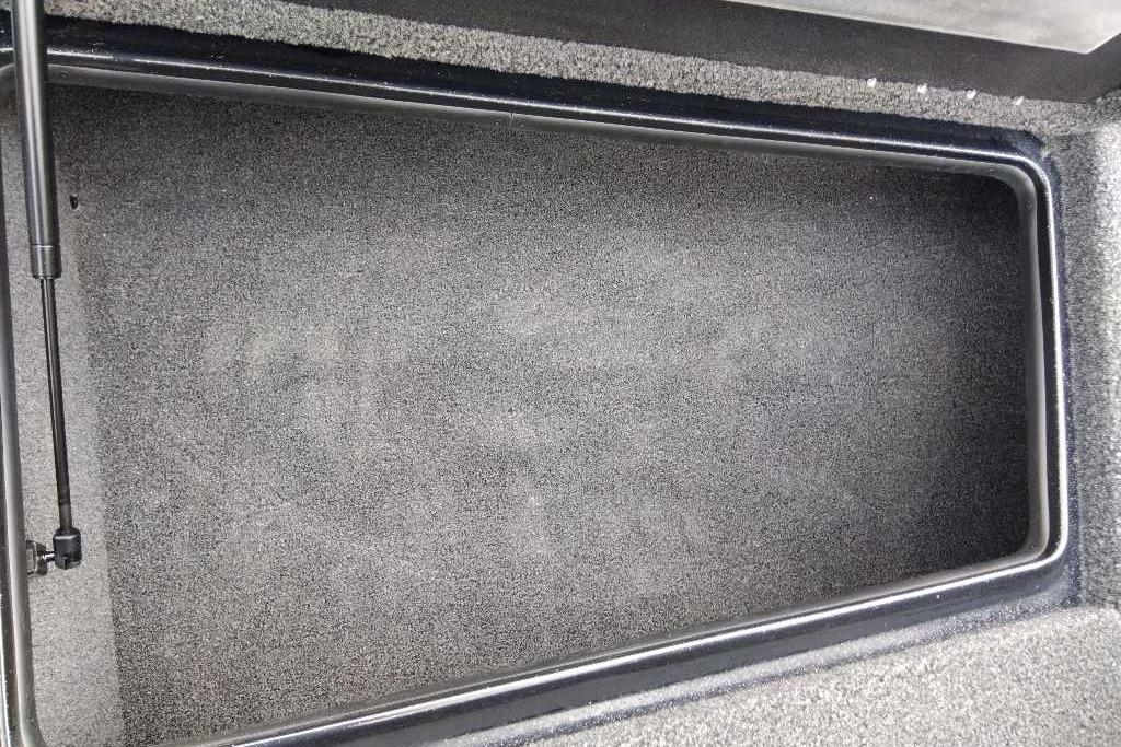 Empty storage compartment in a 2026 Nitro Z17 boat.