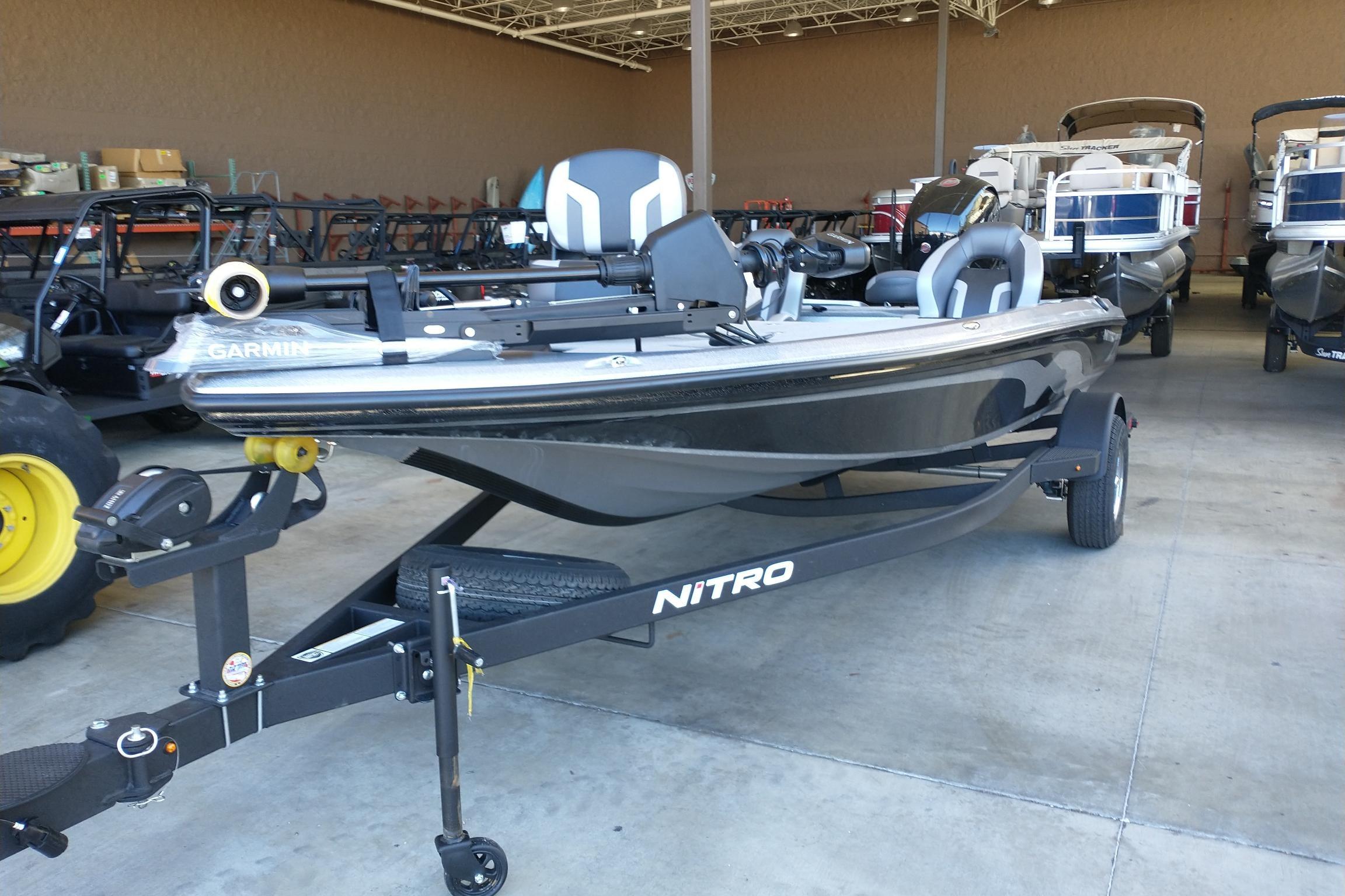 2026 Nitro Z18 Pro boat in showroom, featuring sleek design and advanced Garmin technology.
