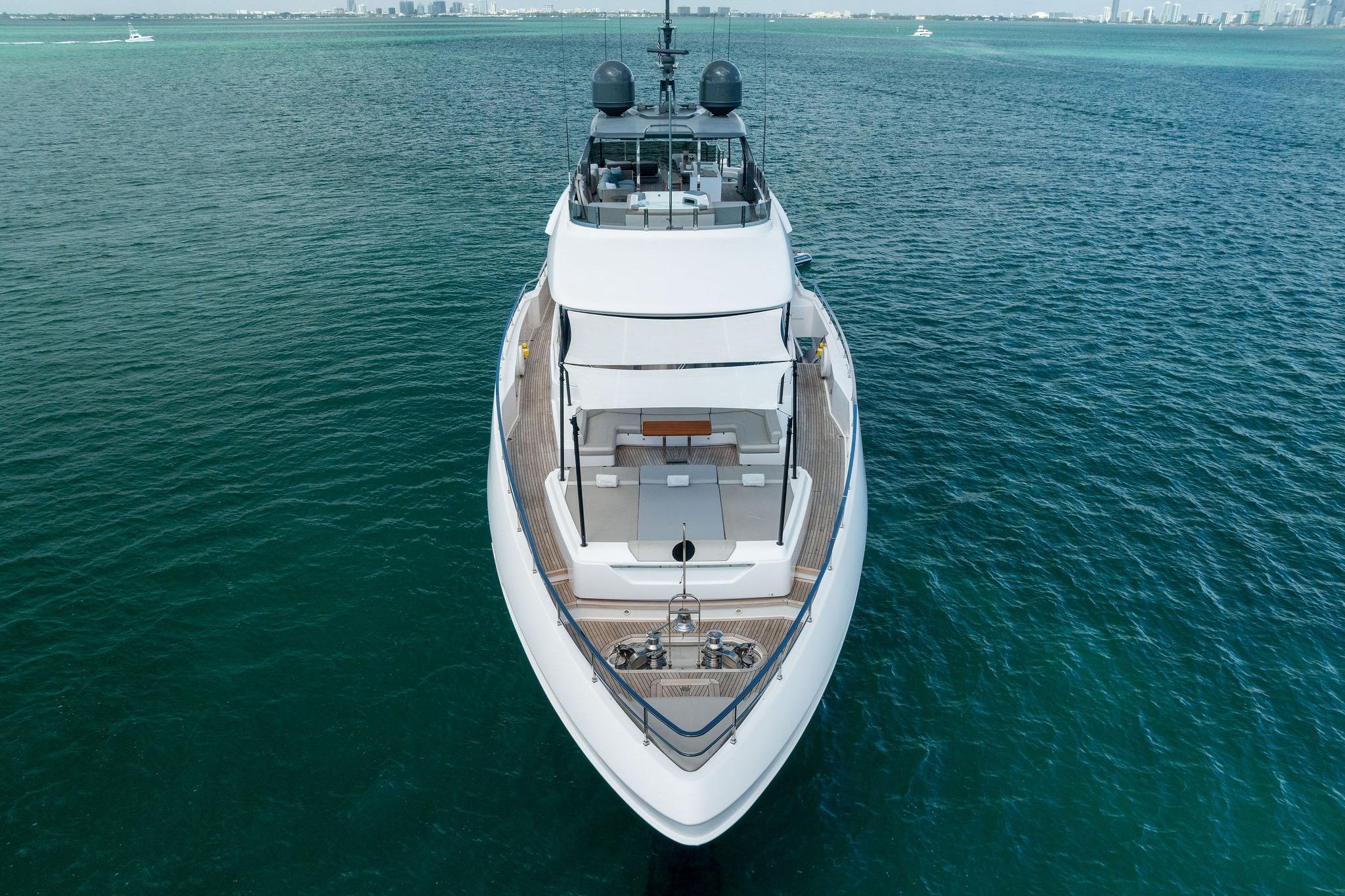 Luxurious 2023 Custom Line Navetta 33 yacht cruising on open sea.