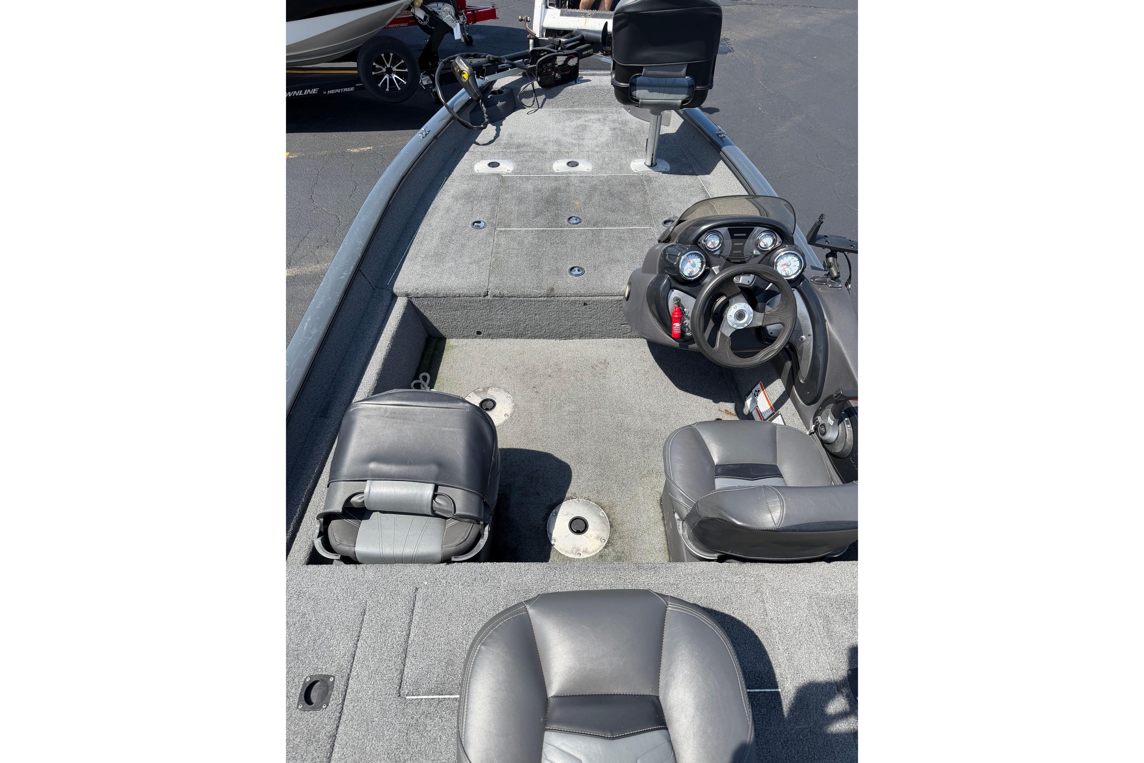 2019 Tracker Pro Team 175 TF boat interior with steering console and seating.