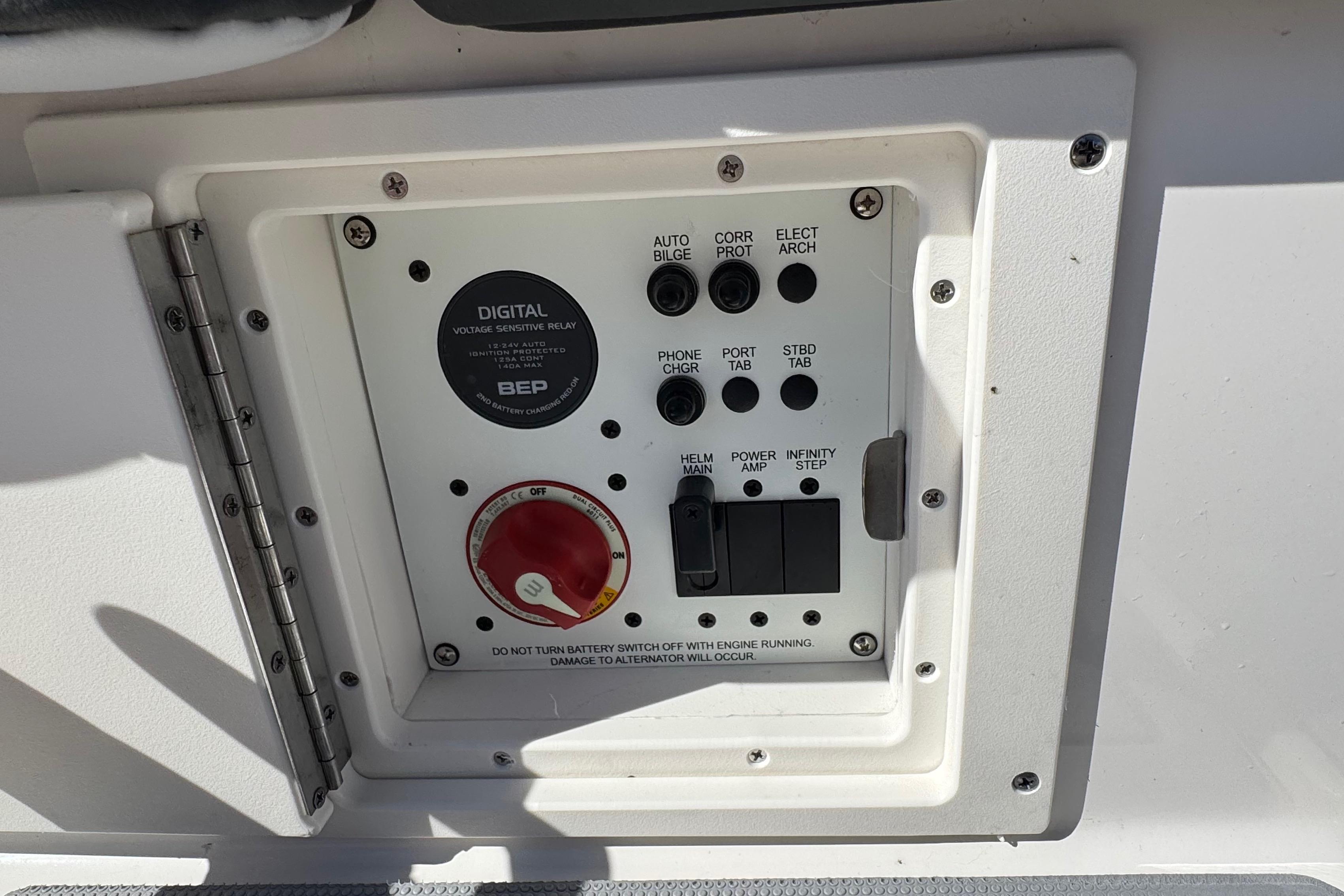 Control panel of a 2026 Chaparral SSX 4 boat with various switches and indicators.