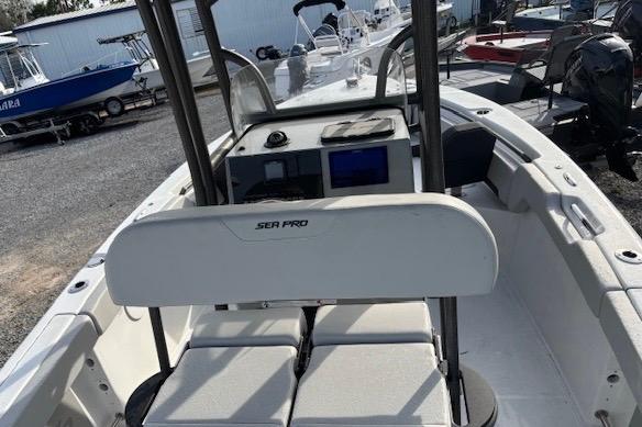 2025 Sea Pro 225FLX Sandbar boat interior with seating and console.