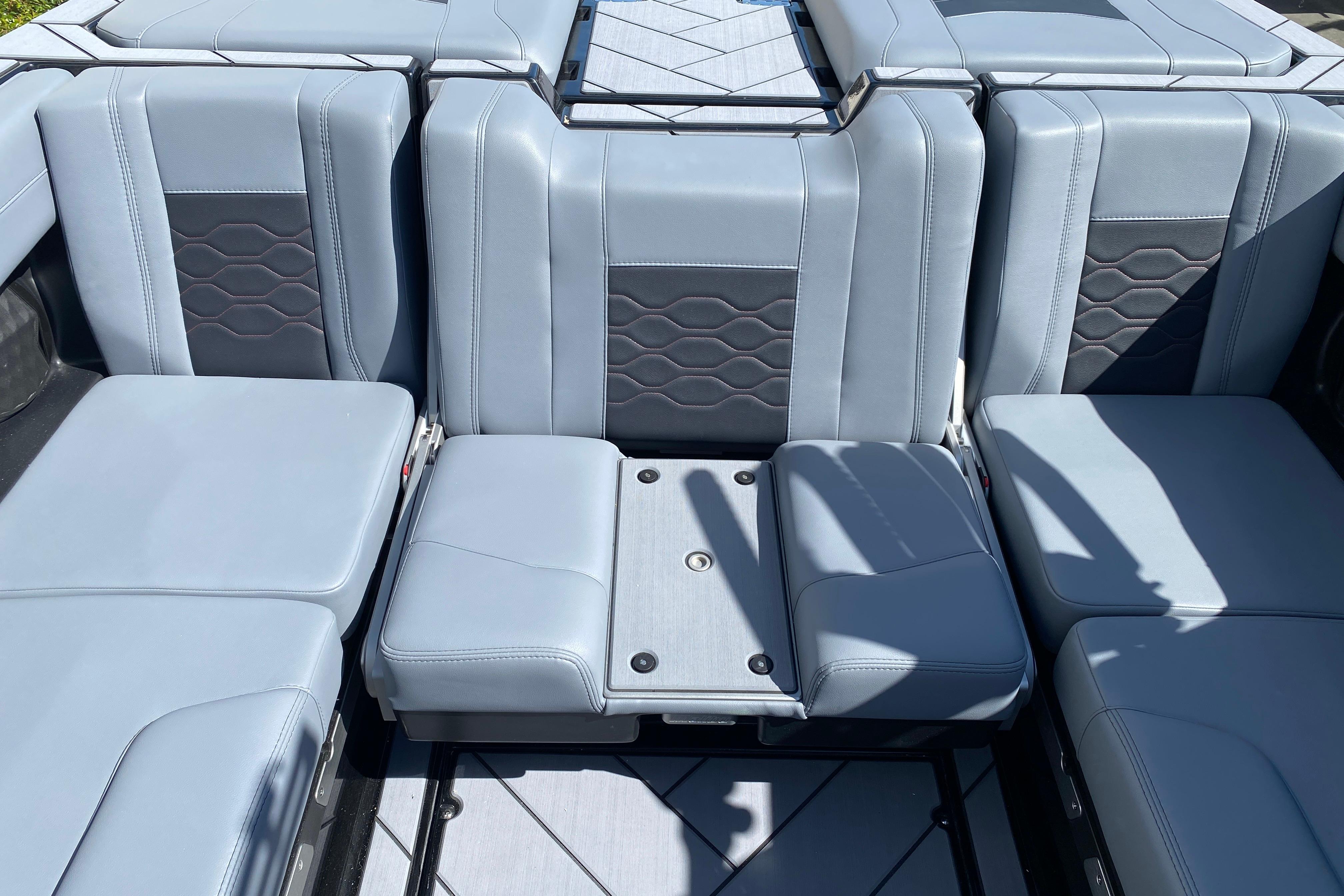 2025 Malibu Wakesetter 23 LSV interior with sleek gray seating and modern design.