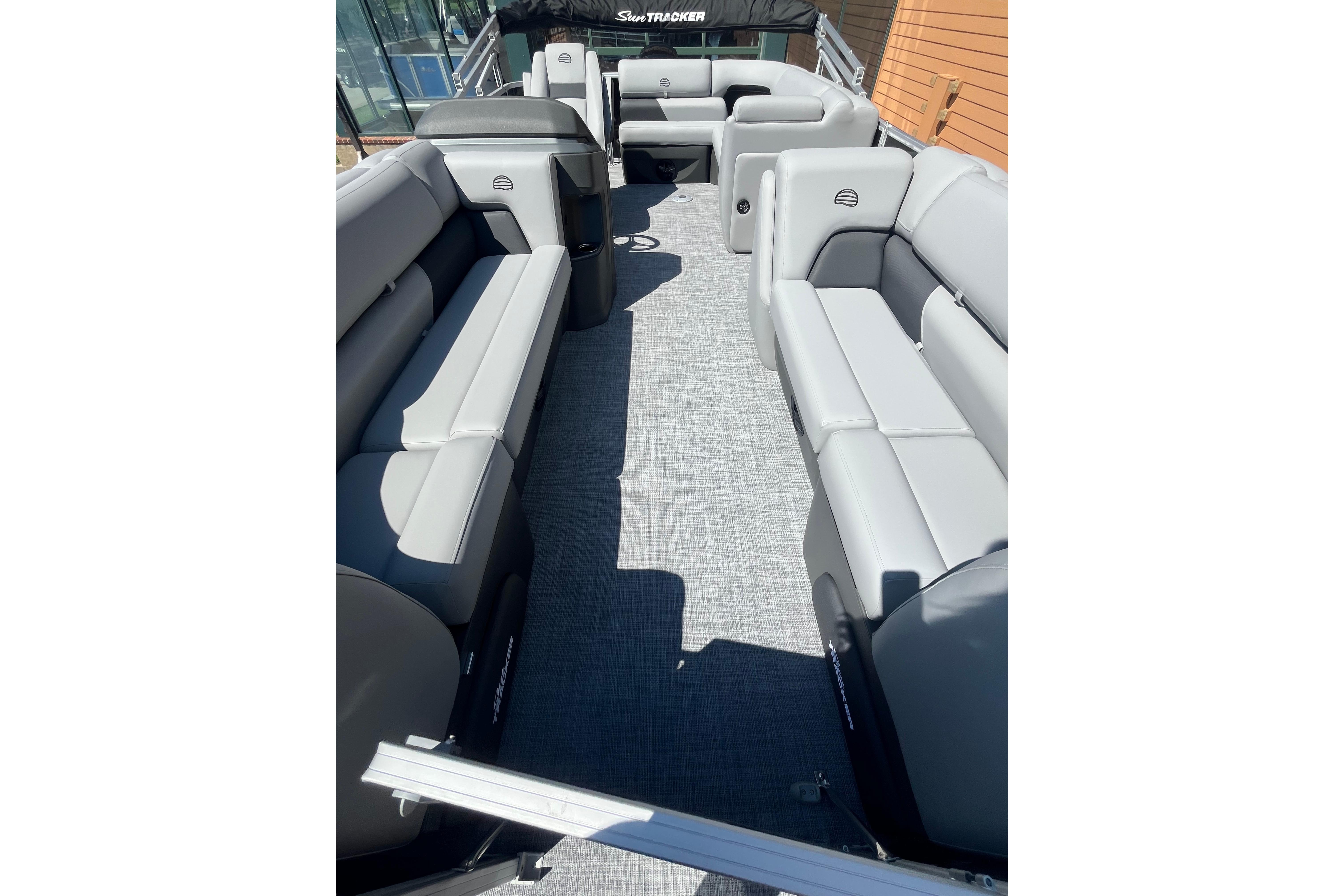 2026 Sun Tracker Party Barge 20 DLX interior with spacious seating and modern design.