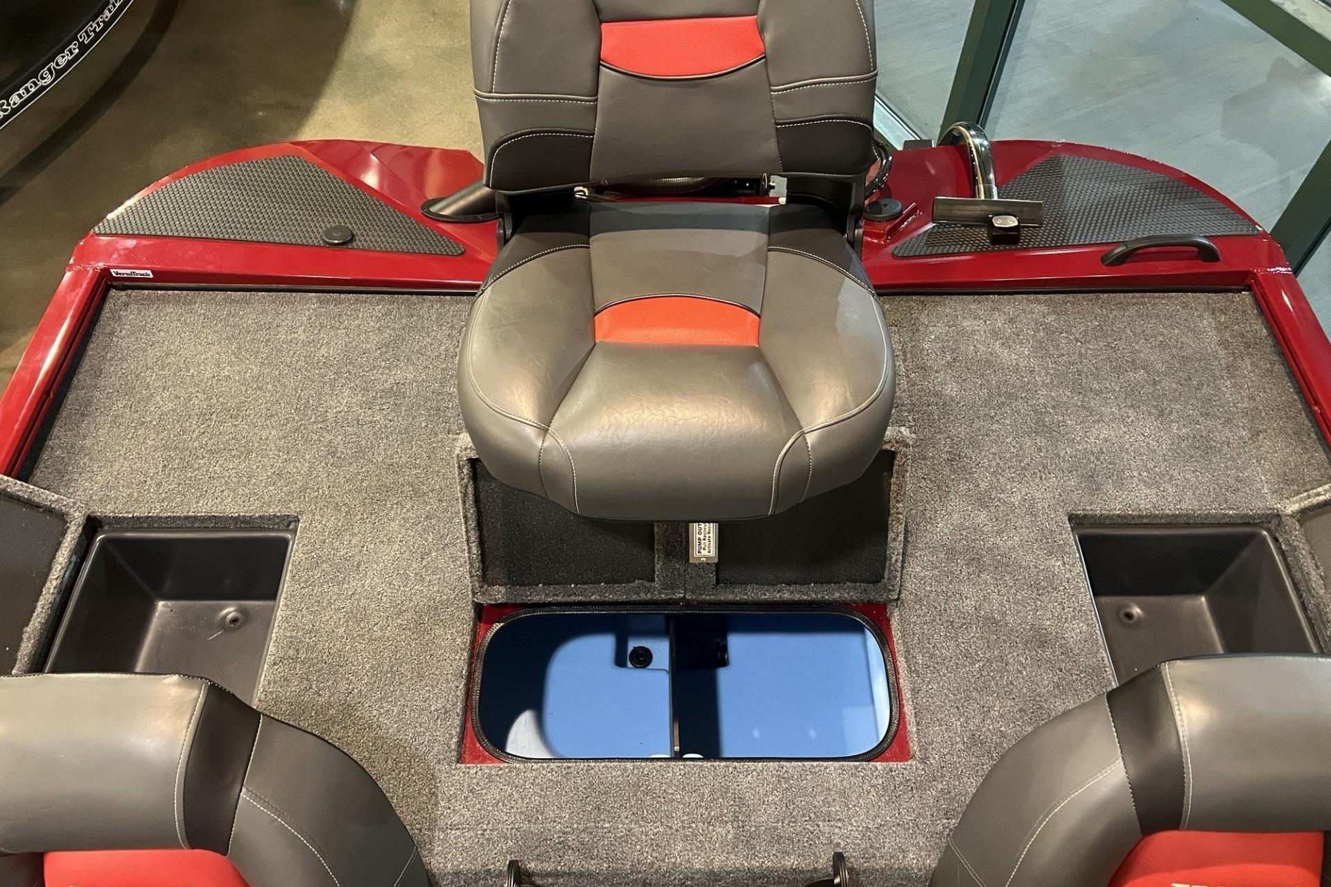 2025 Tracker Savage 215 boat interior with seating and storage compartments.