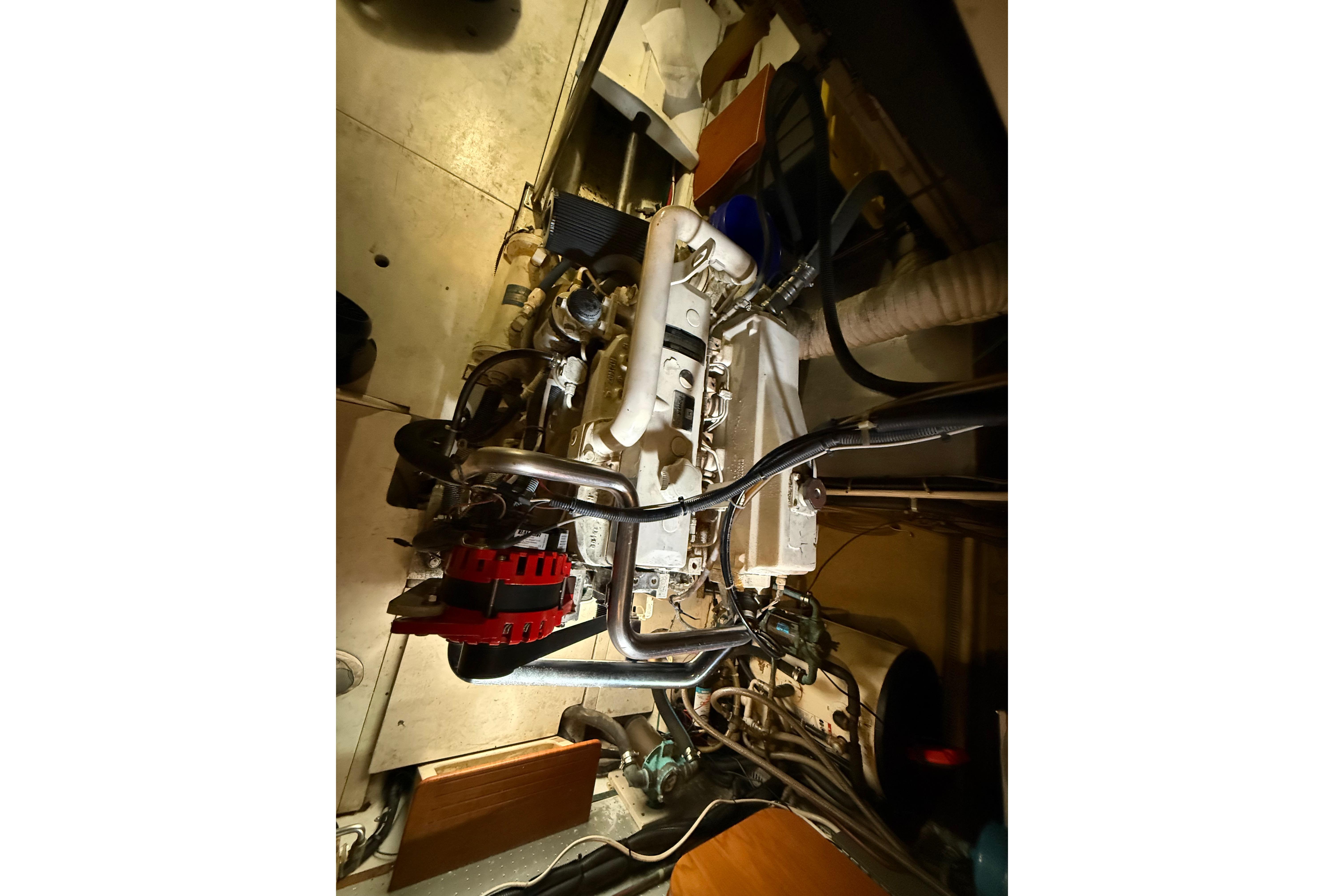 Engine compartment of a 2001 Kadey-Krogen 39 boat, showcasing mechanical components.