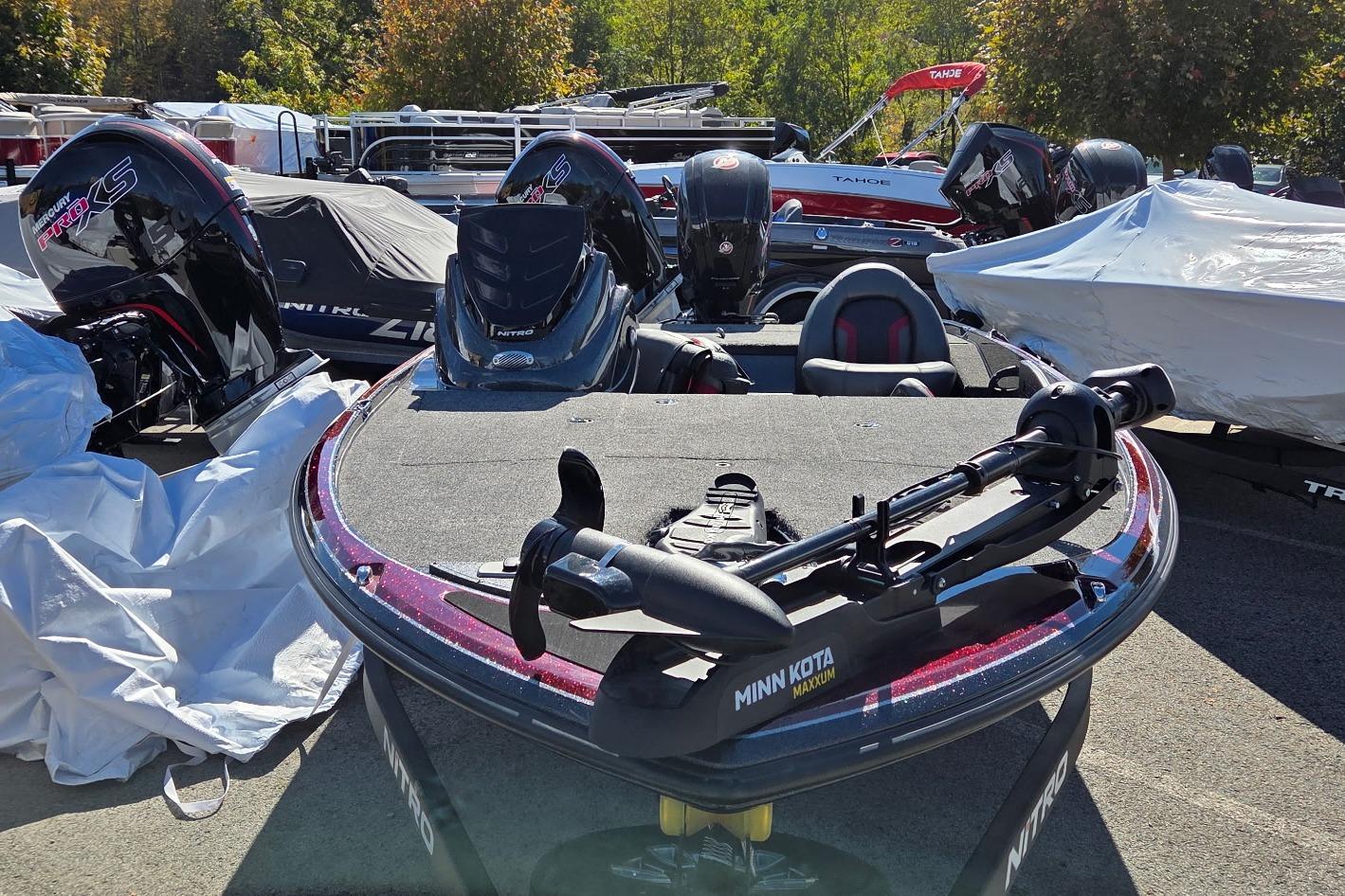 2026 Nitro Z17 boat with Minn Kota Maxxum motor, parked outdoors.