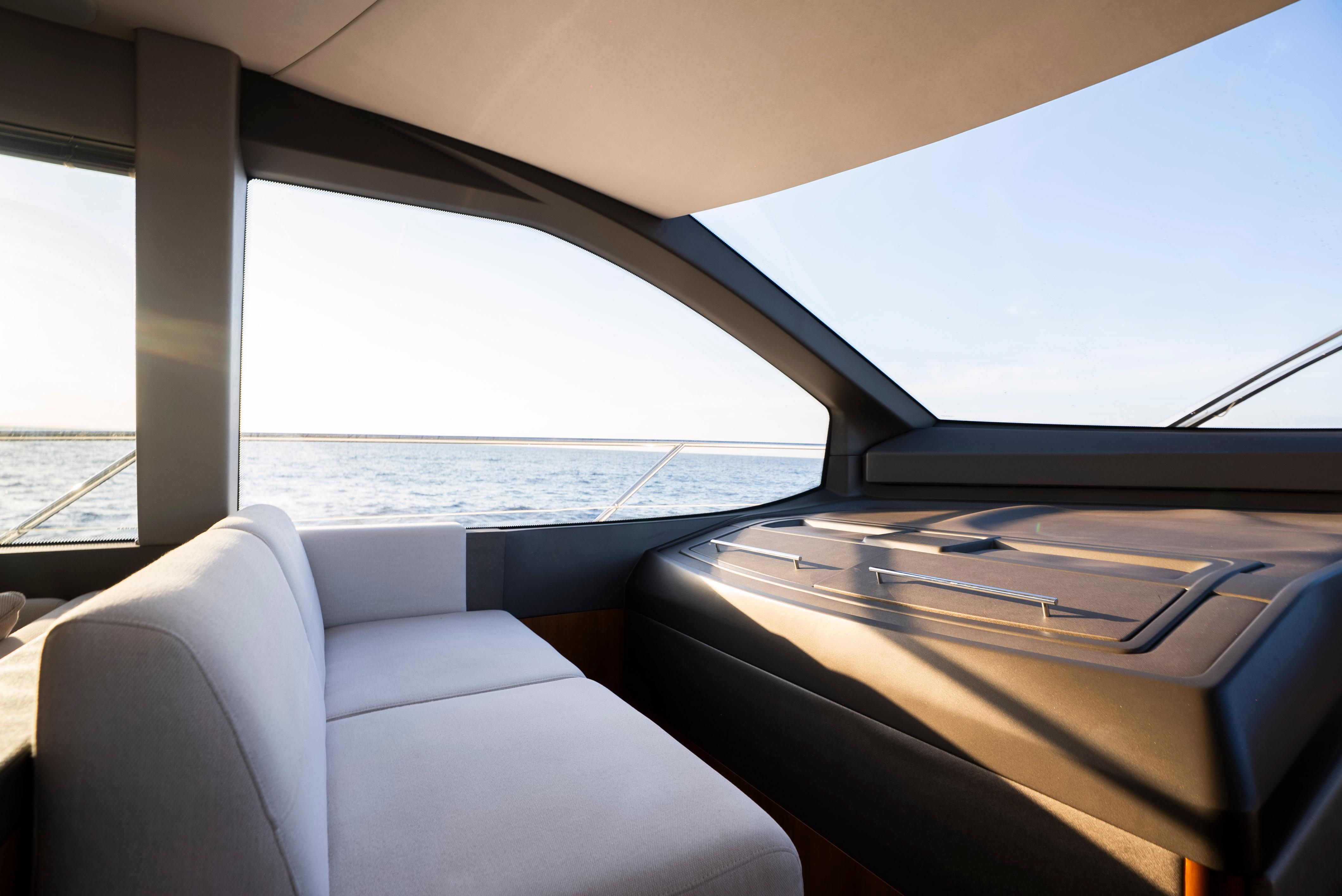 Interior view of 2017 Sunseeker Manhattan 66 yacht with ocean backdrop.
