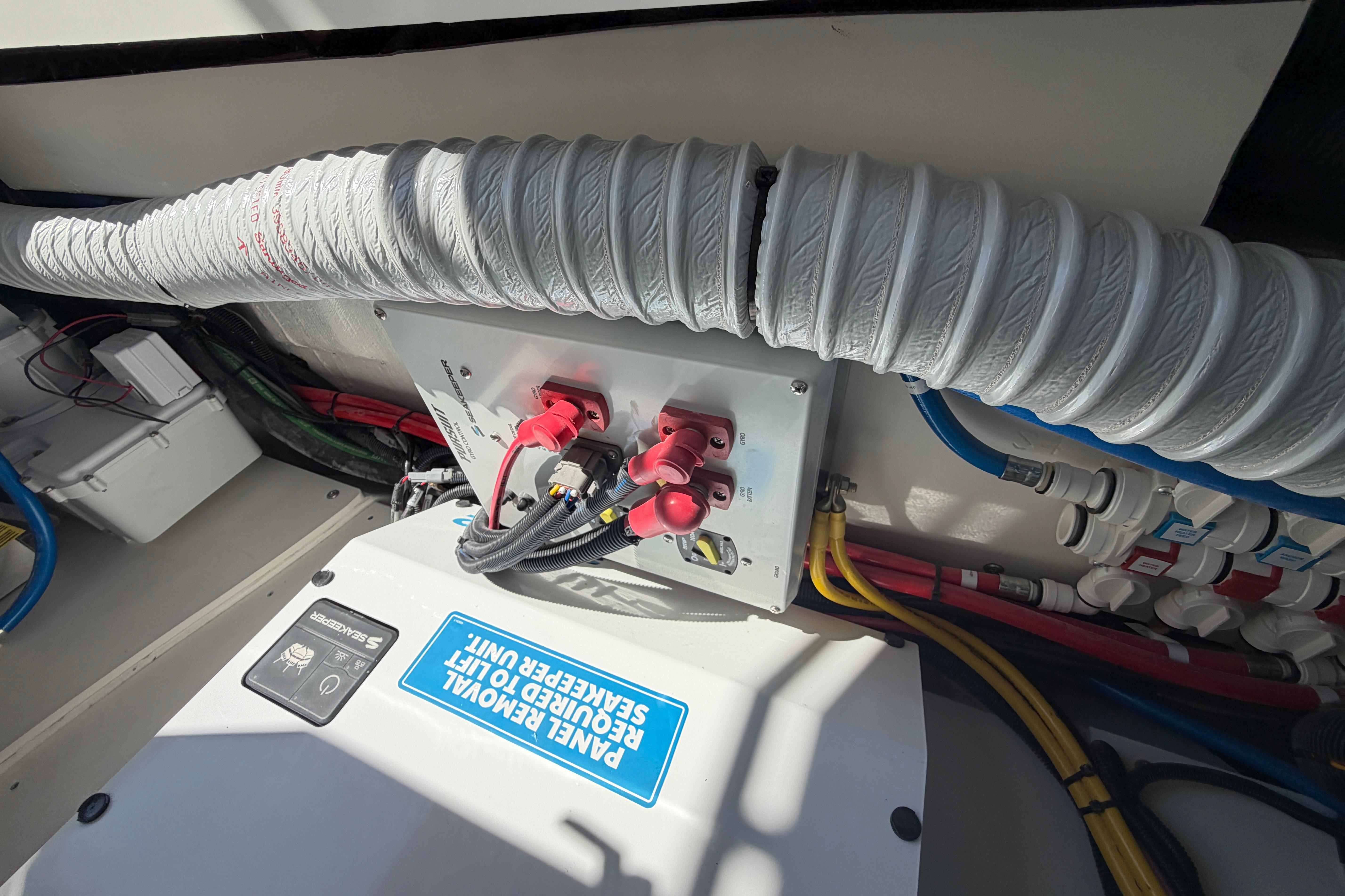 Electrical panel and wiring inside 2026 Pursuit S 358 Sport boat.