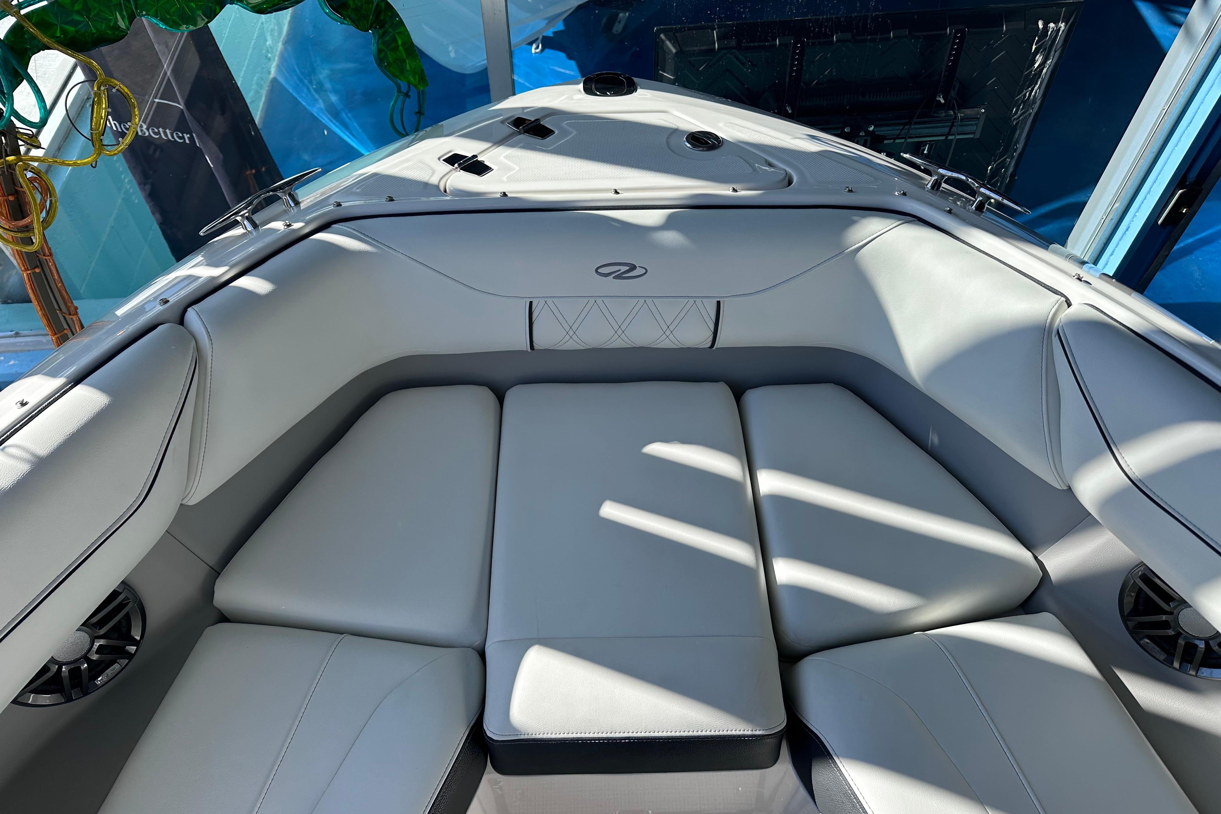2026 Regal LX4 boat interior with luxurious white seating and modern design.