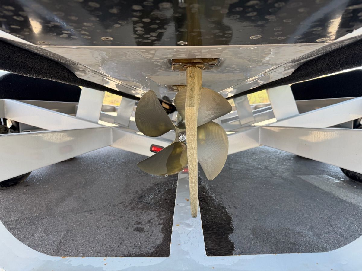 Close-up of a boat propeller on a trailer.