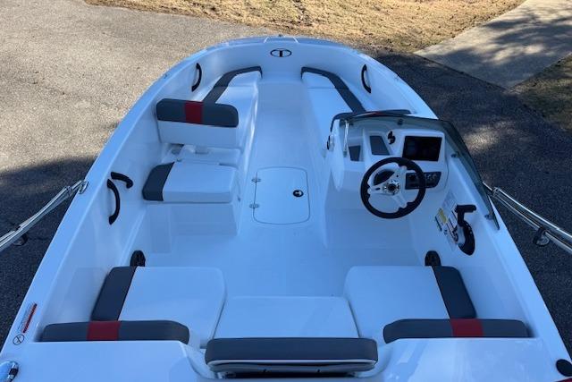 2026 Tahoe T16 boat interior with seating and steering console.