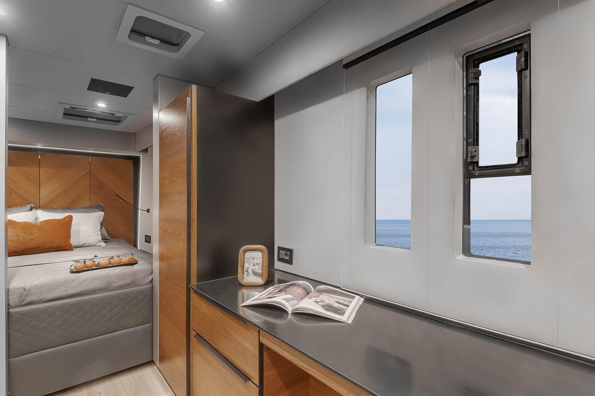 Luxurious interior of 2026 Sunreef 50 yacht with ocean view and modern design.