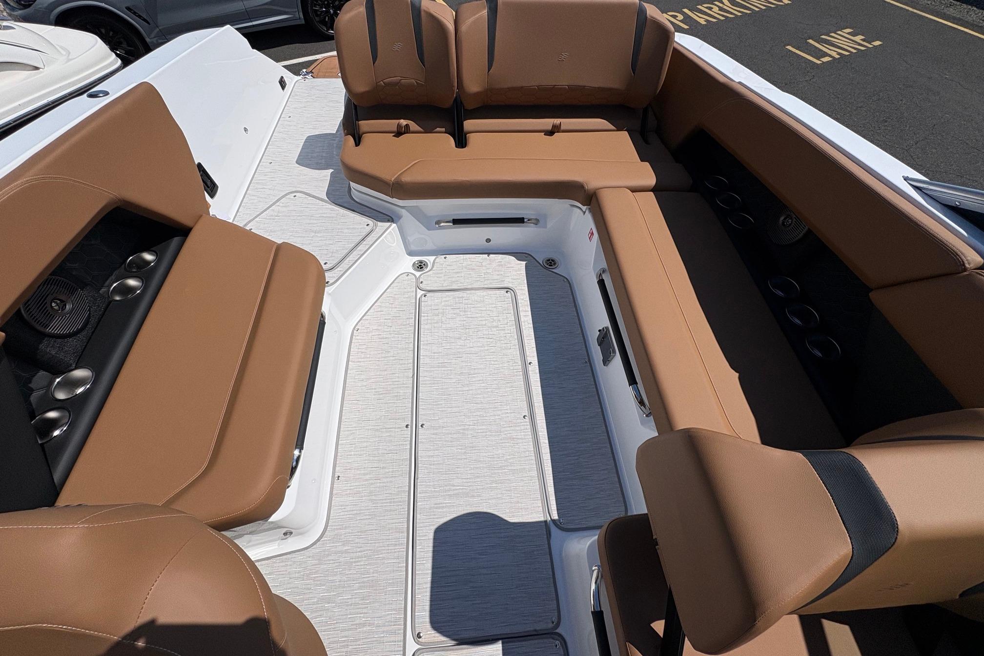 Interior of 2026 Four Winns H6 boat with tan seating and modern design.
