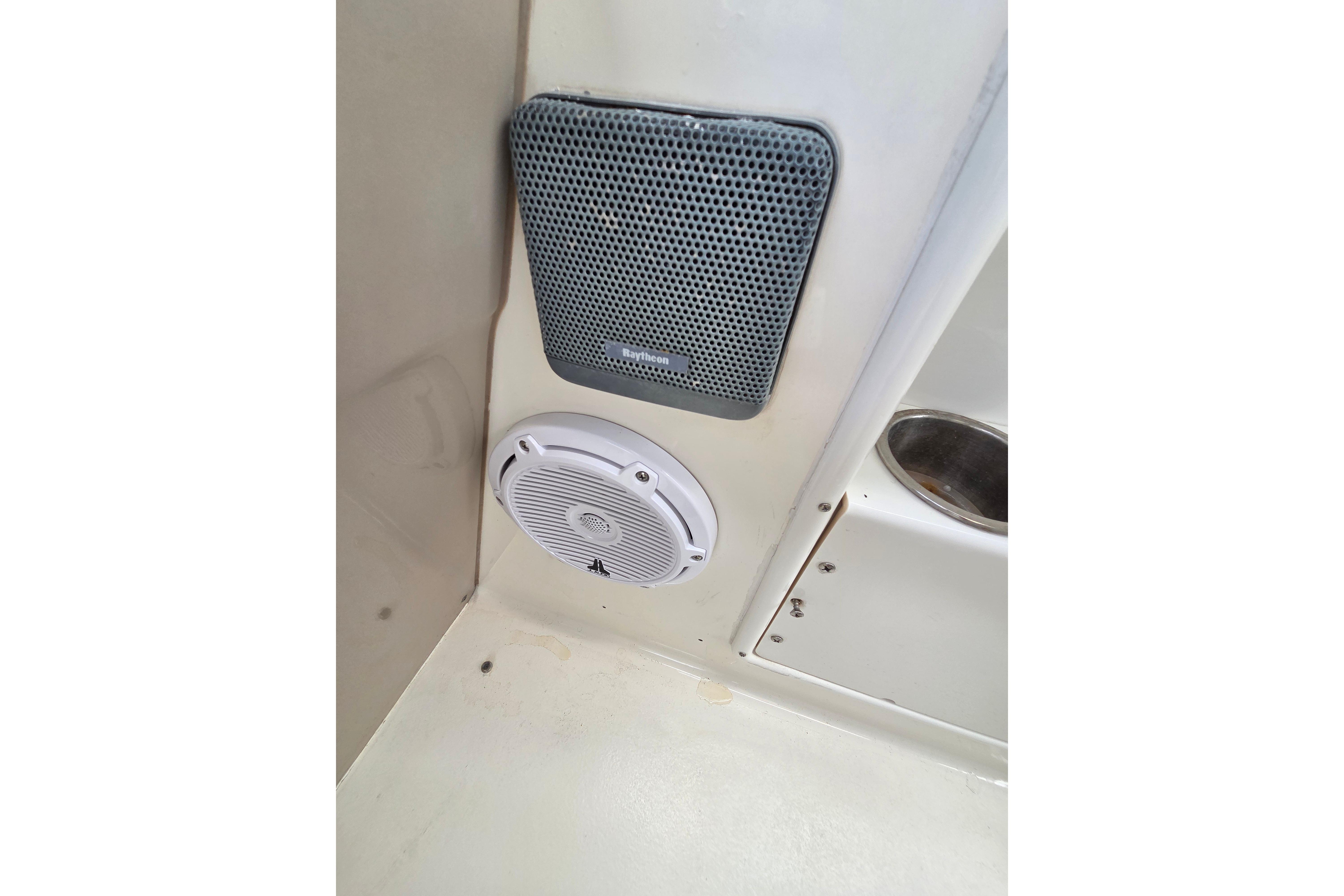 Speaker and vent on 2000 Sea Ray 340 Sundancer boat interior.