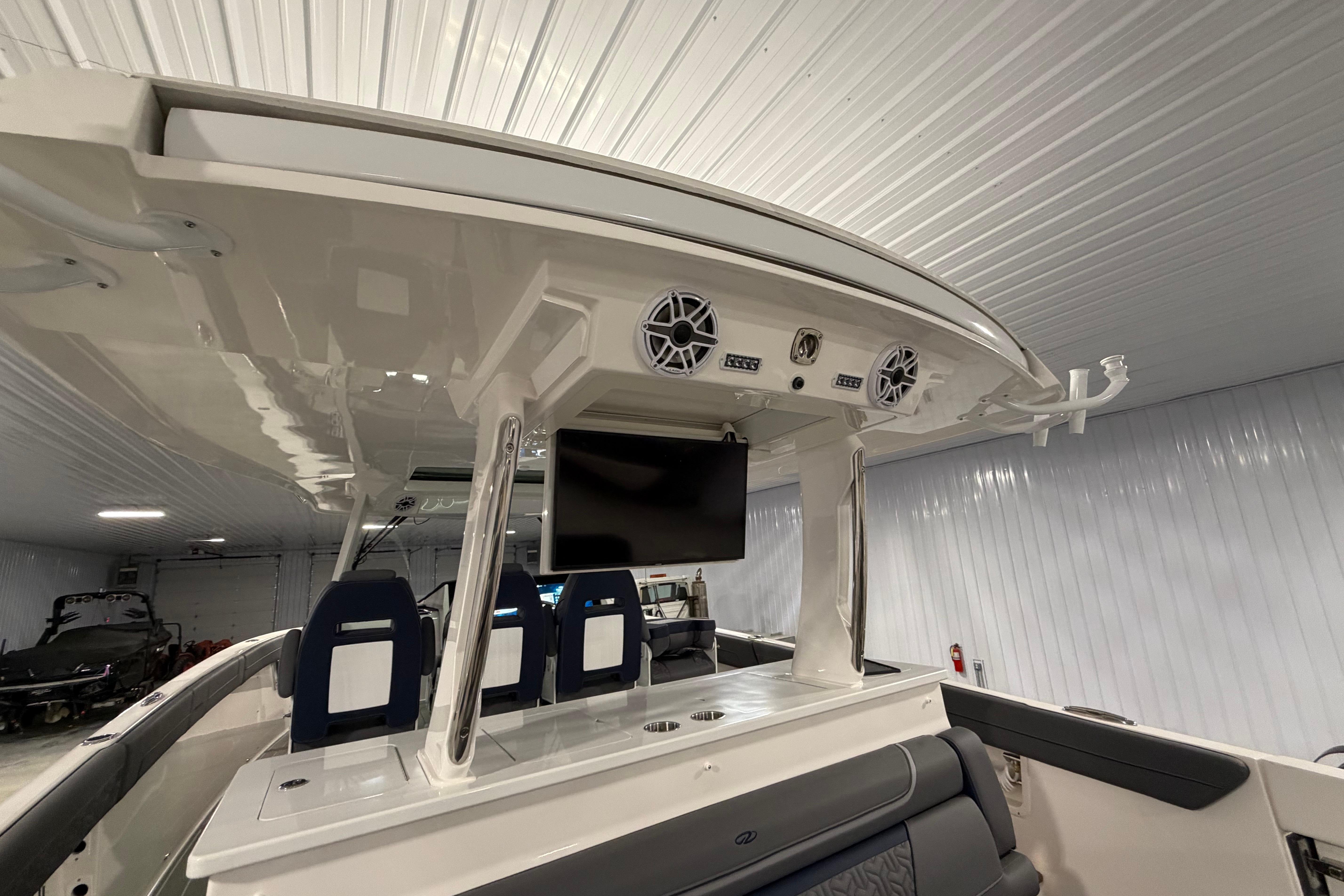 2027 Regal 38 Surf boat interior with modern seating and entertainment system.