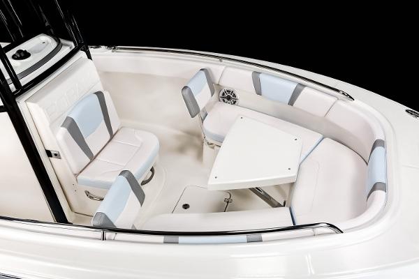 Manufacturer Provided Image: 2025 Robalo R232 Explorer boat interior with seating and table, featuring modern design and comfort.