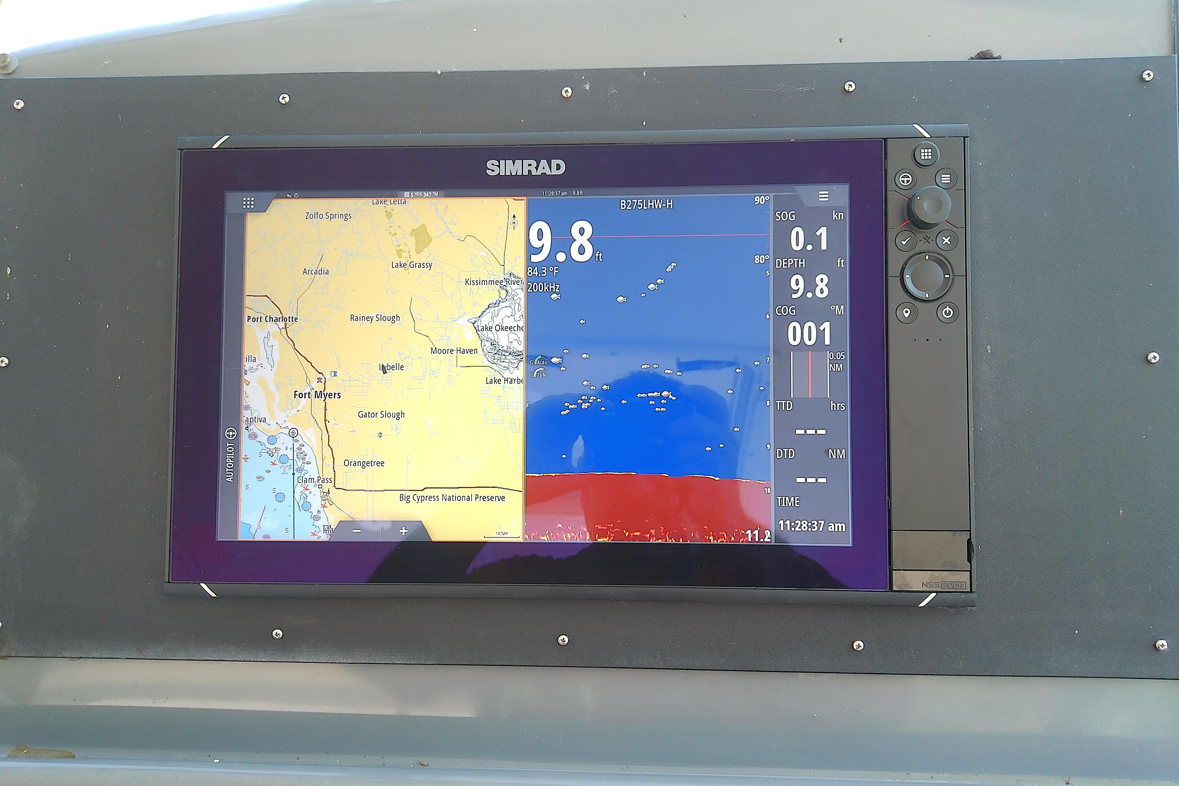 Simrad navigation display on 2000 Tiara Yachts 4100 Open, showing map and sonar data.