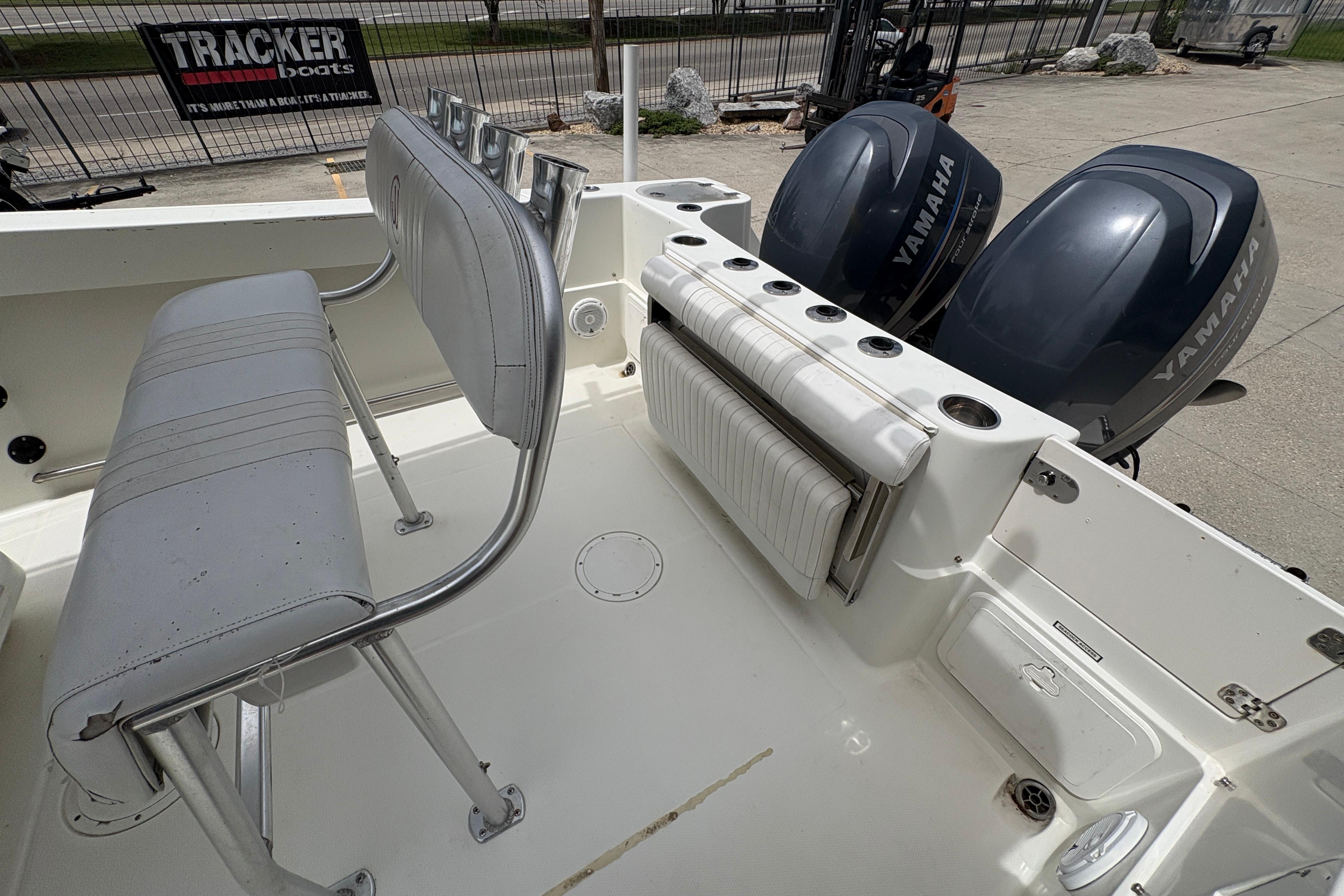 Interior of 2006 Sail Faish 2360 boat with Yamaha engines and seating.