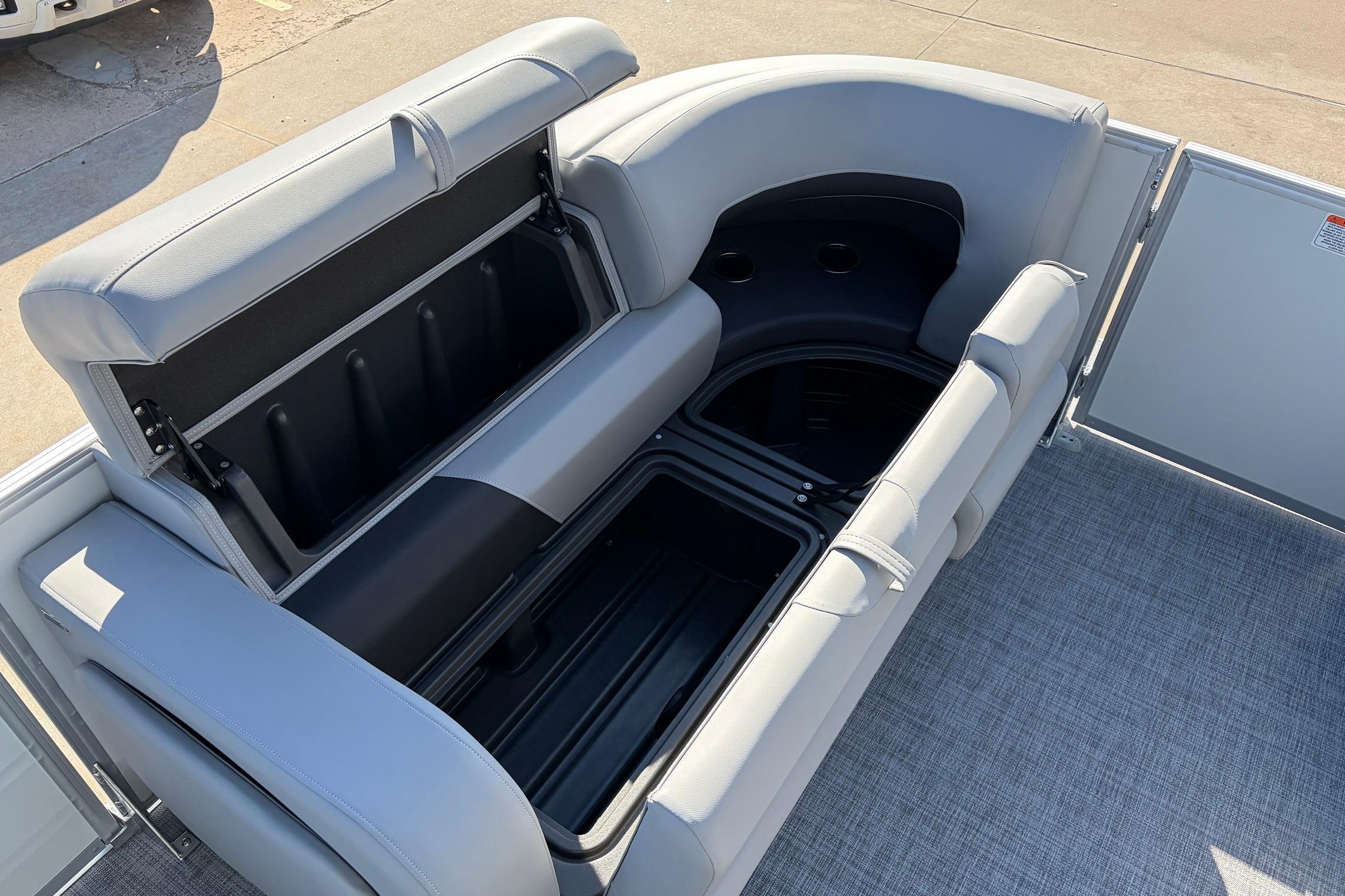 2026 Sun Tracker Party Barge 22 RF XP3 seating with open storage compartments.