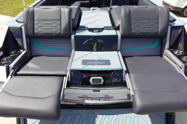 2022 Malibu Wakesetter 25 LSV boat interior with luxurious seating and modern design.